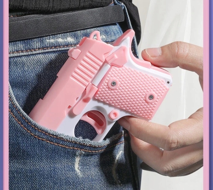 V2 STRZELAJĄCY PISTOLET ZABAWKA ANTYSTRESOWA FIDGET TOY PISTOLECIK FIOLET Płeć chłopcy unisex