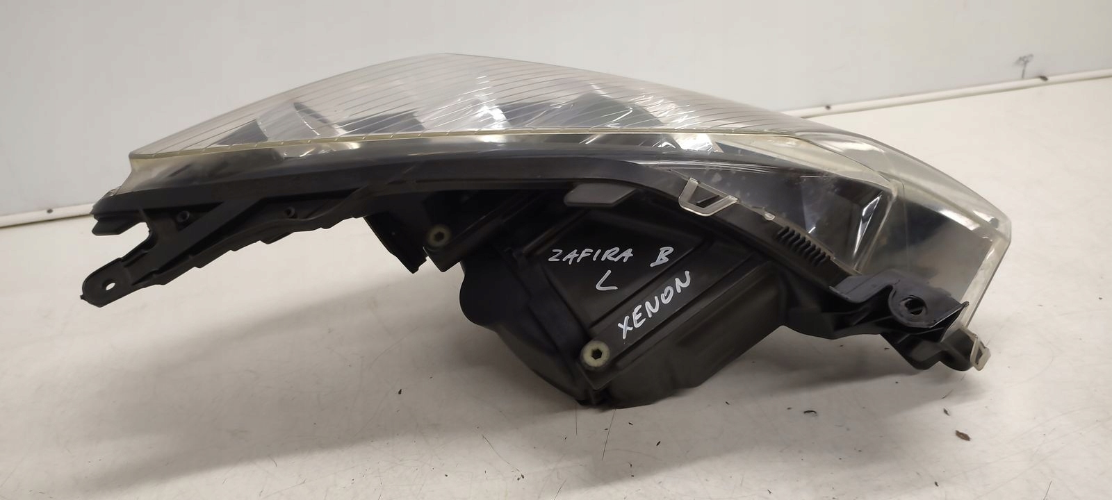 light front front left xenon positioning Opel Astra H