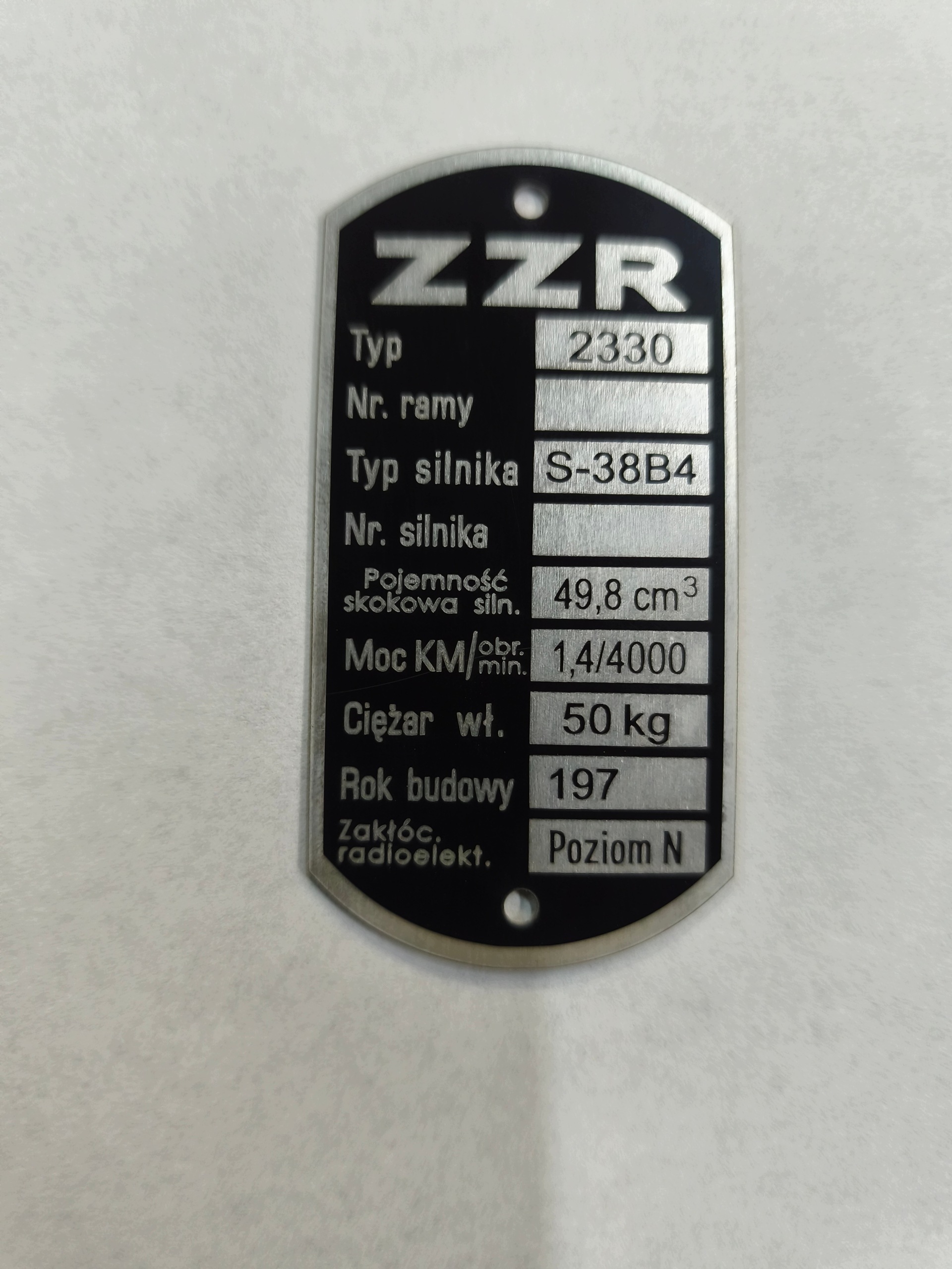 Komar Tabliczka Znamionowa Każdy Model Czysta