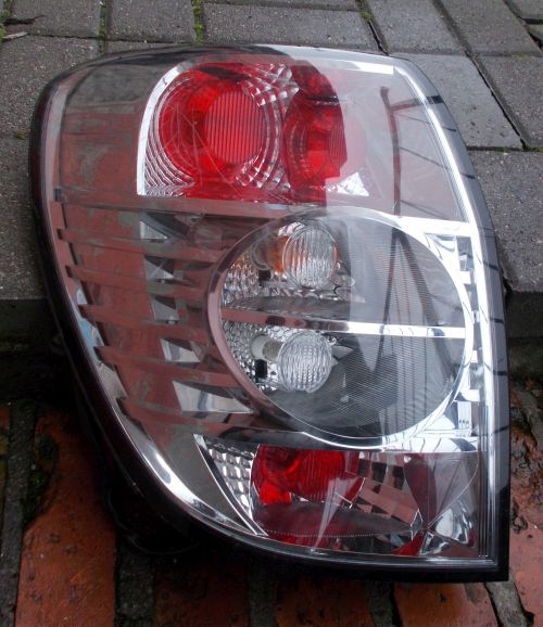 CHEVROLET CAPTIVA LIFT LEWA TYLNA LAMPA ORYGINAŁ