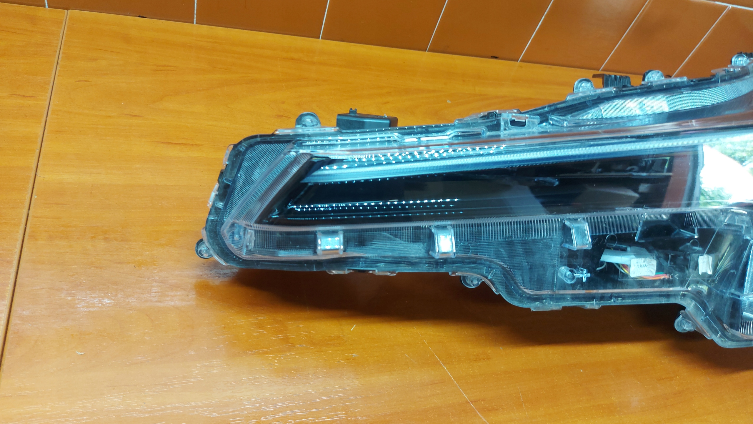 REFLEKTOR light left left front TOYOTA COROLLA E21 KOMBI HB 23- LIFT