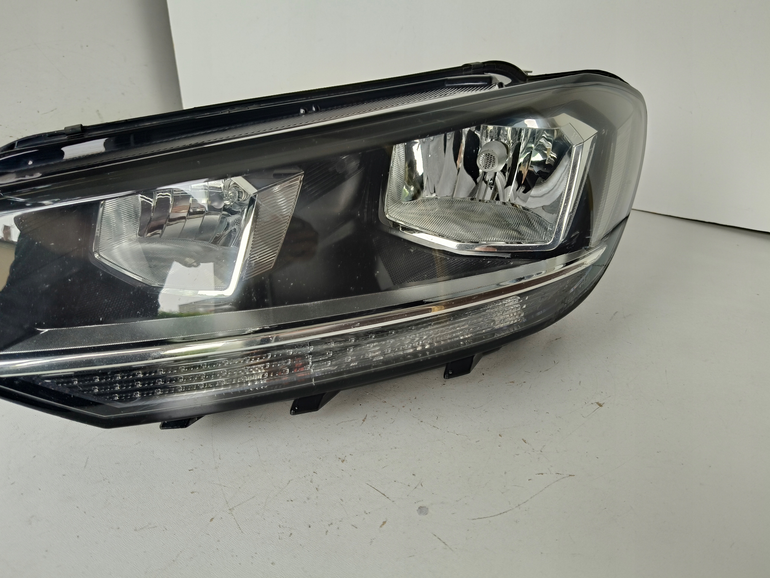 light left REFLEKTOR VW TOURAN 5TA 16