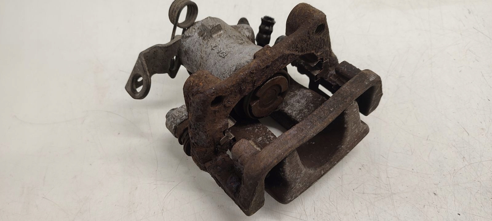 caliper rear part rear left Opel Meriva B 1,4 16V