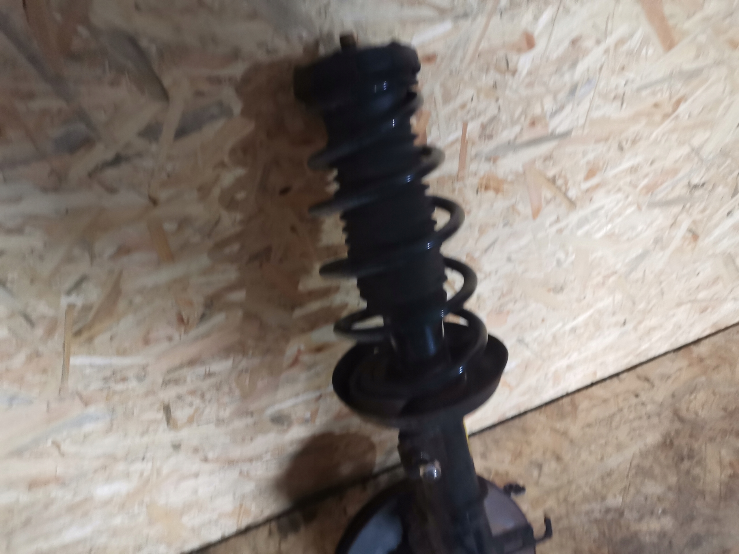 McPherson shock absorber swing left front OPEL ZAFIRA C 13419917