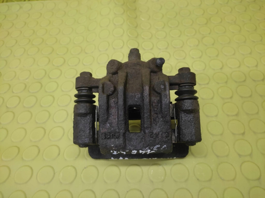 KIA RIO II 1.4 caliper left rear part
