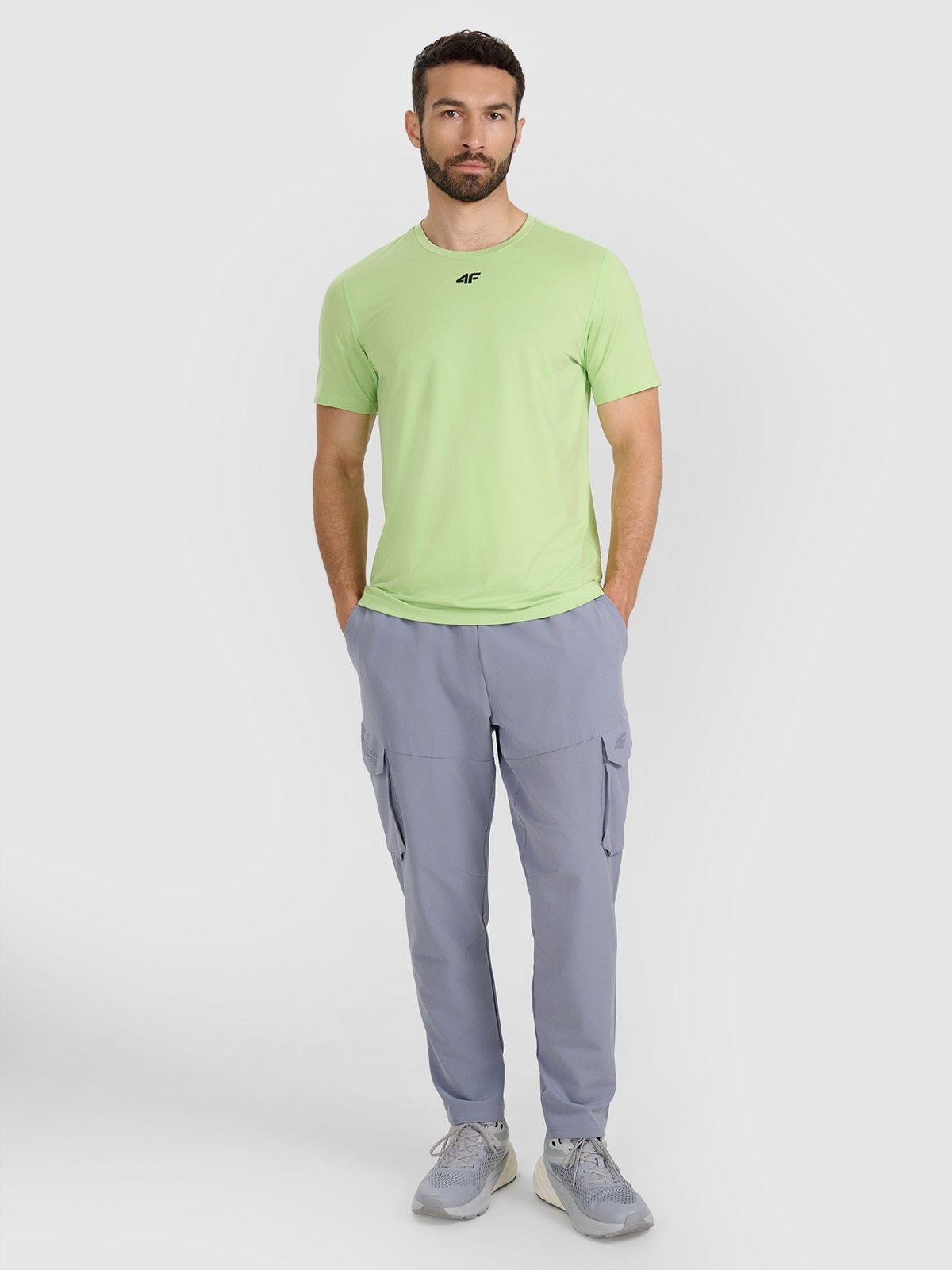 4F Tréninkové tepláky modré L