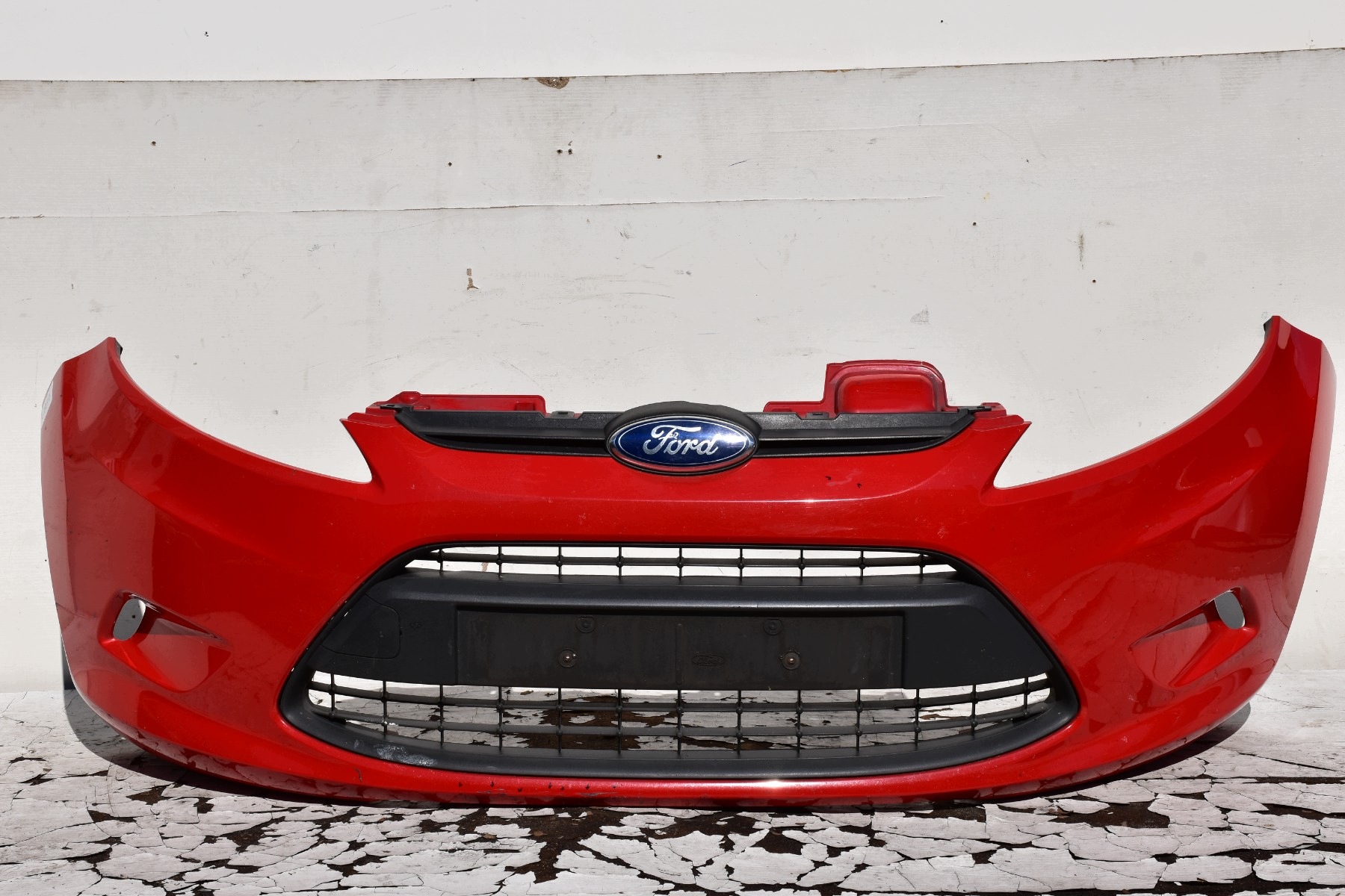 bumper front FORD FIESTA MK7 pre facelift 2008-2012 code lakieru: Colorado Red