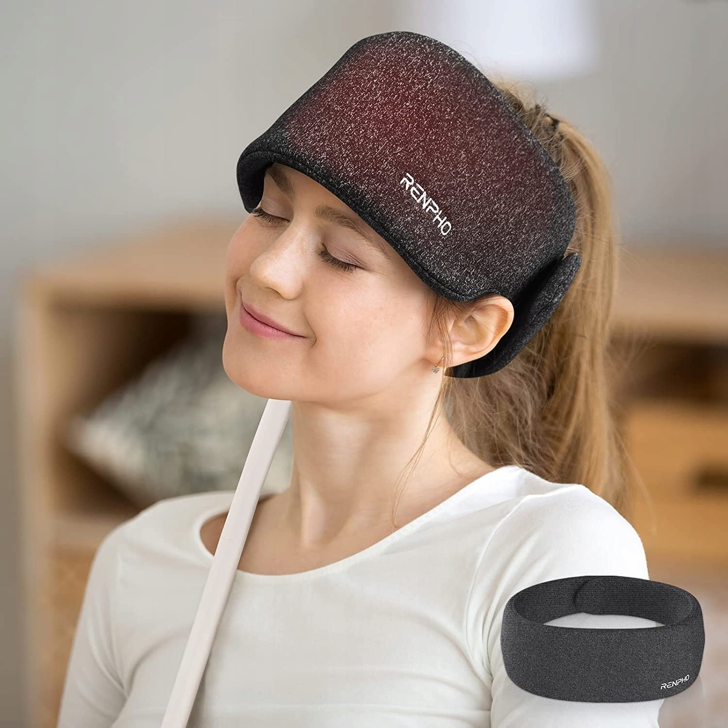 Masażer kompresyjny grzejący uciskający na bóle głowy