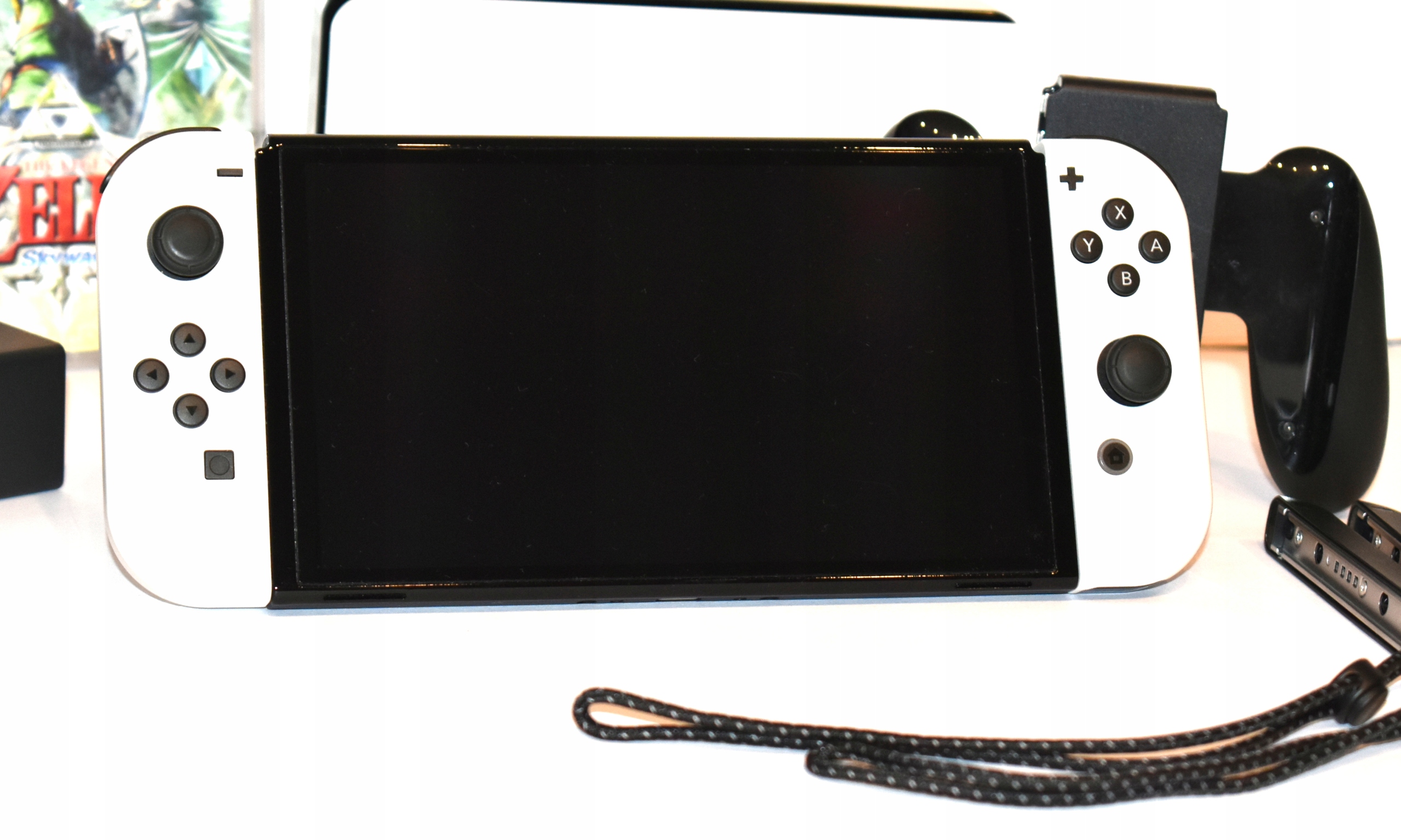 NINTENDO SWITCH OLED + ZELDA + GRY !!! Szerokość produktu 23.9 cm