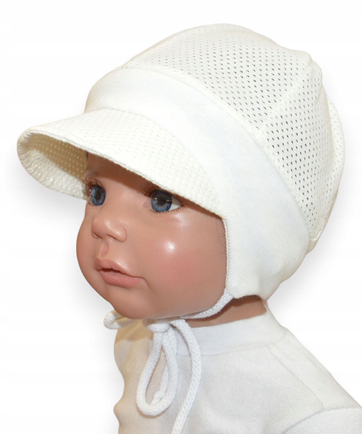 

Letnia ażurowa czapka z daszkiem 47-51cm 18-36m