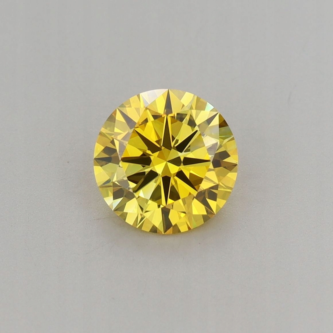 Diament laboratoryjny kolorowy 1.2ct ROUND Fancy Vivid Yellow VVS2 (IGI)