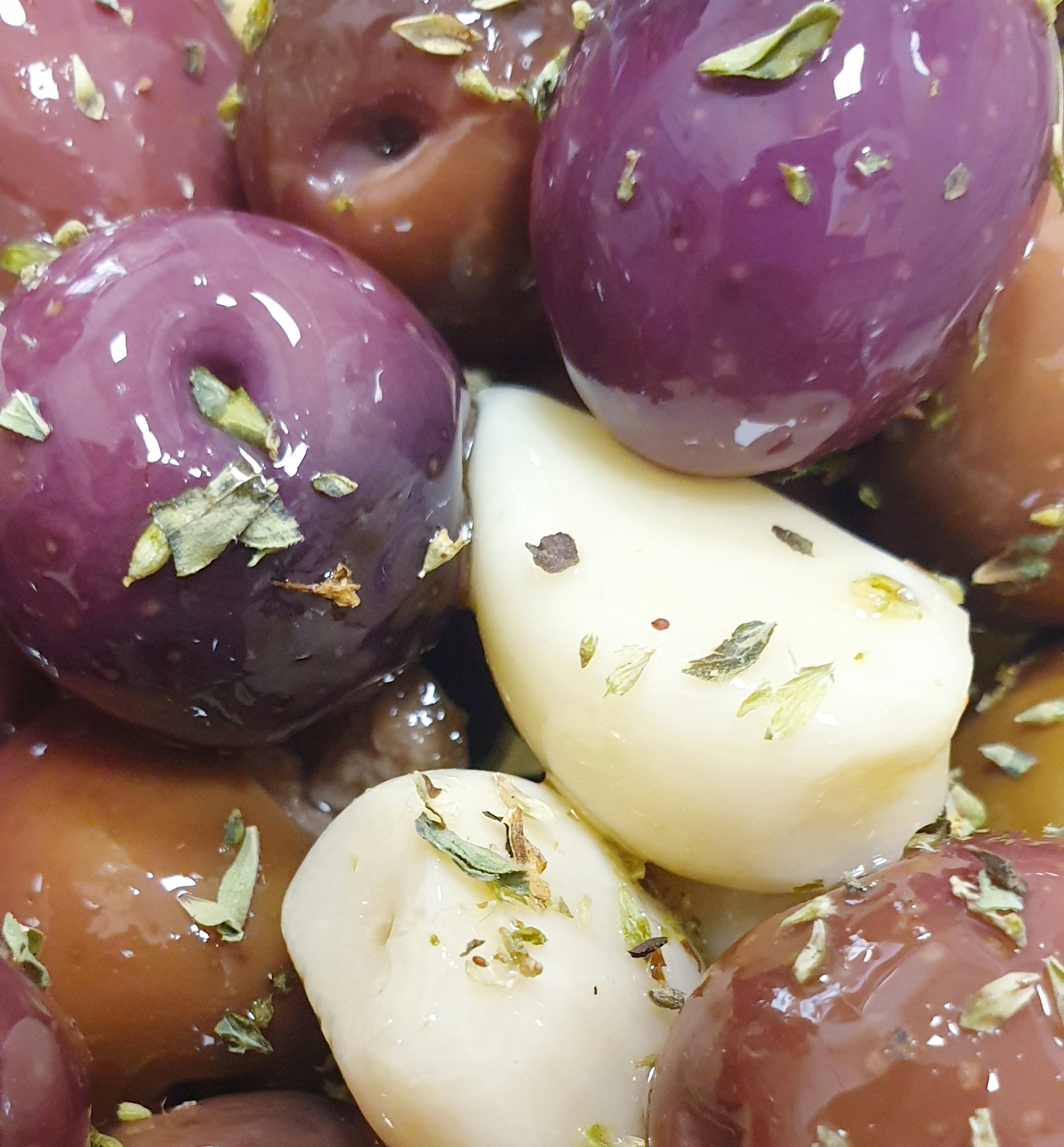 

Oliwki Czarne z pestką z czosnkiem z oregano 250g
