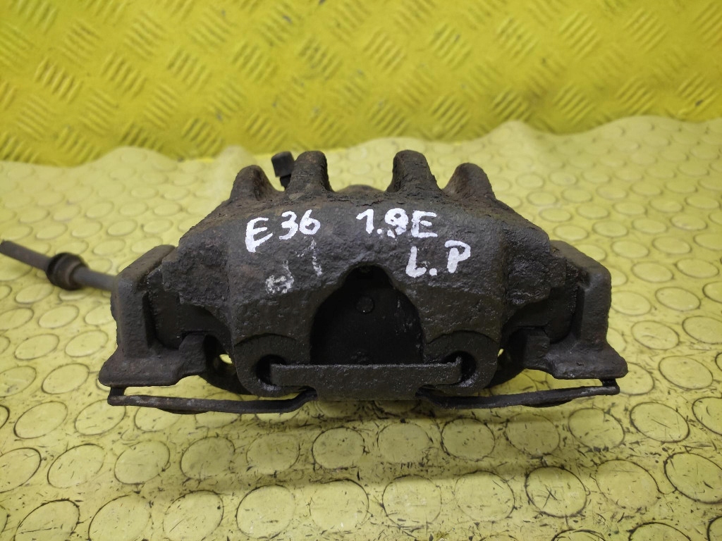 BMW E36 1.8 caliper left front