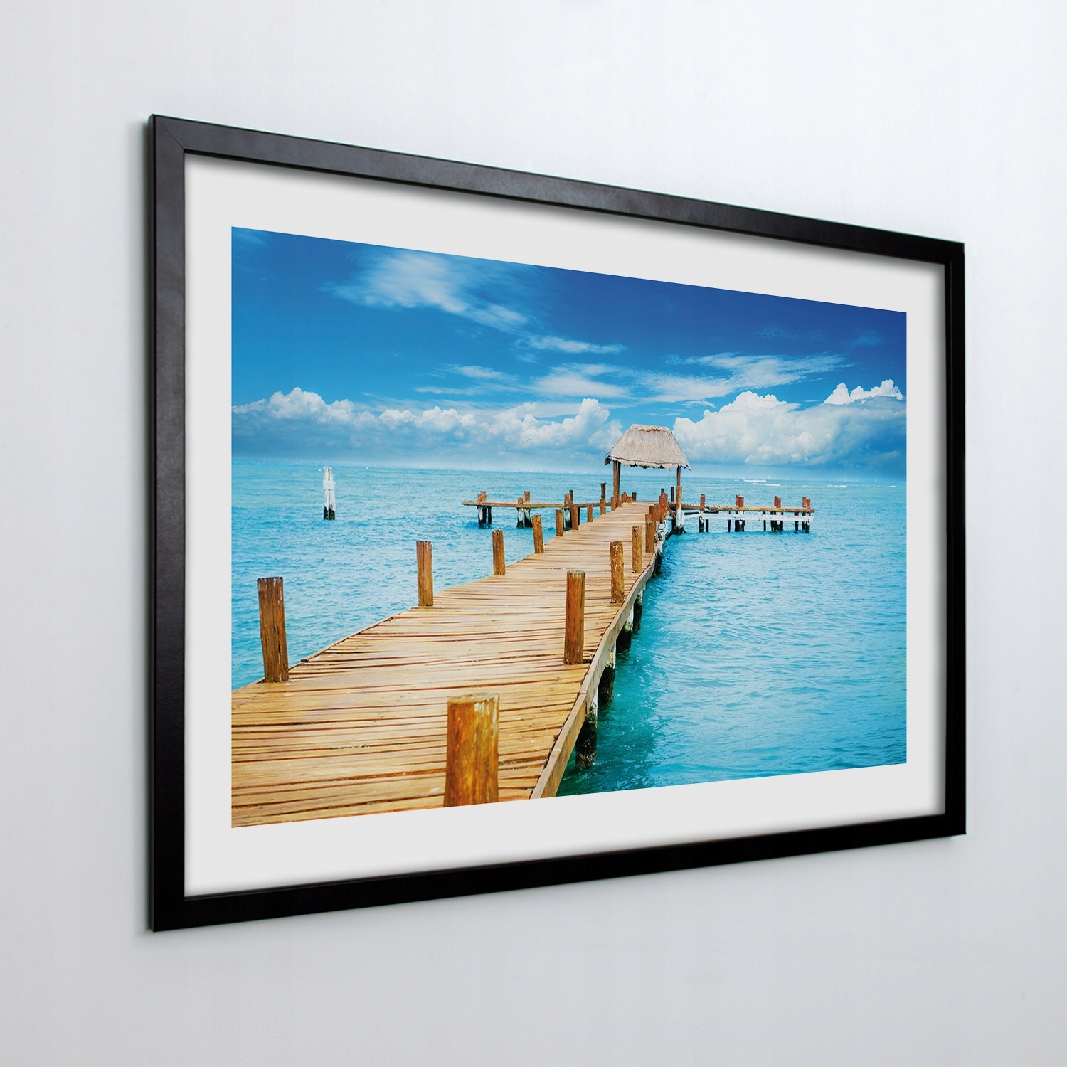 Obraz v rámu na zeď Molo oceán mraky 70x50