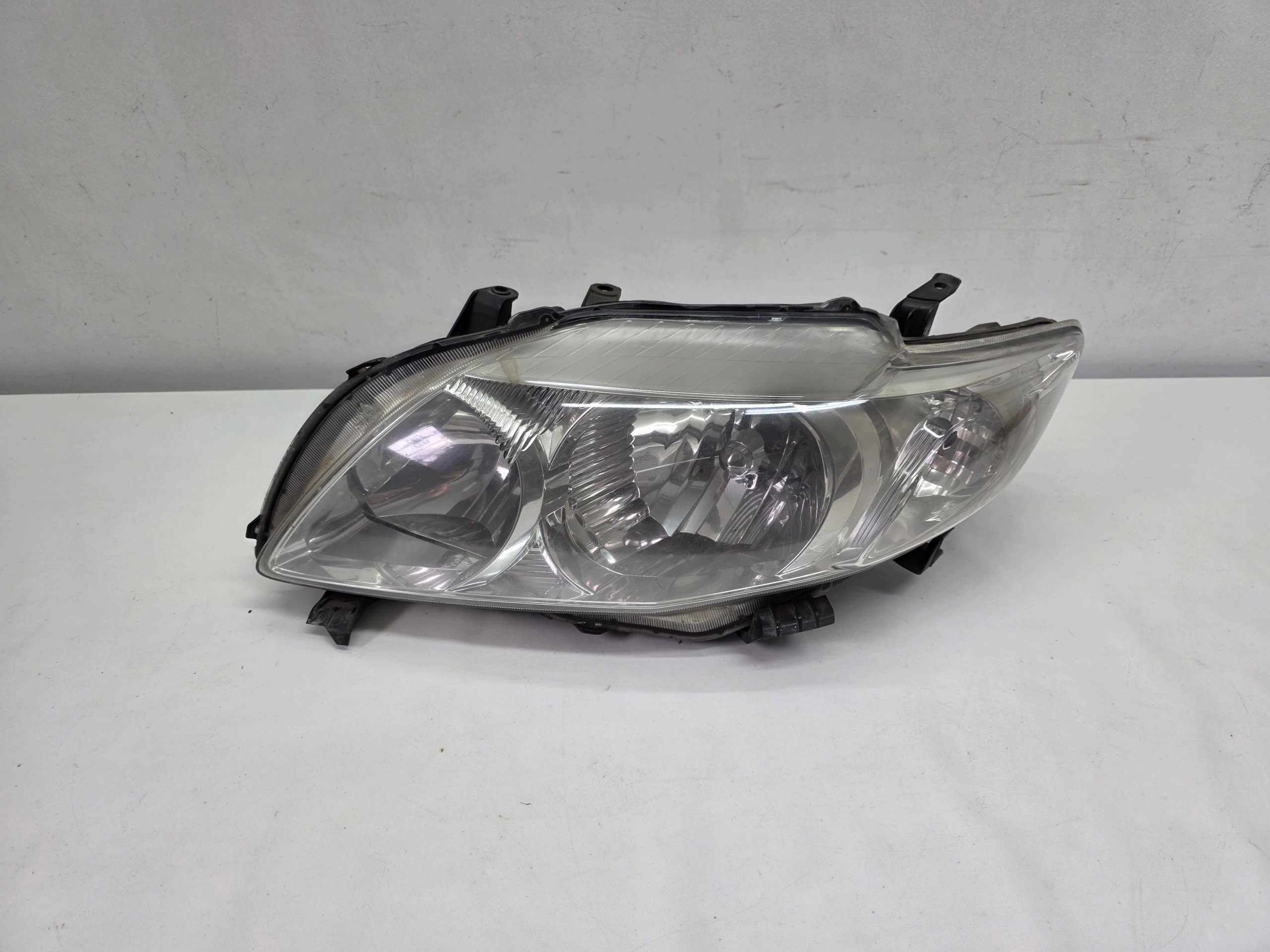 TOYOTA COROLLA E15 07-10 light REFLEKTOR left front original EUROPA