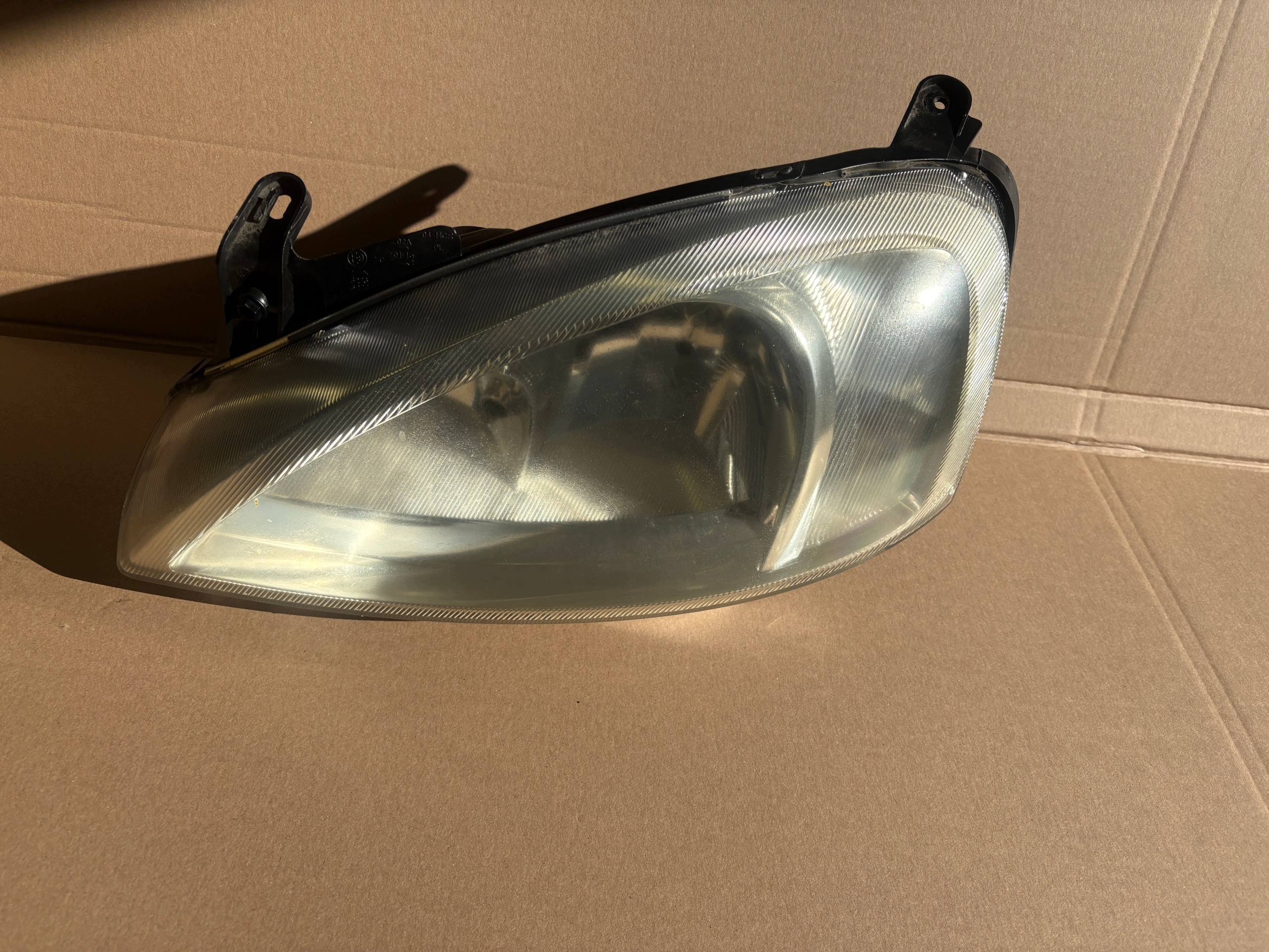 OPEL CORSA C feu gauche avant 09114330 89302111