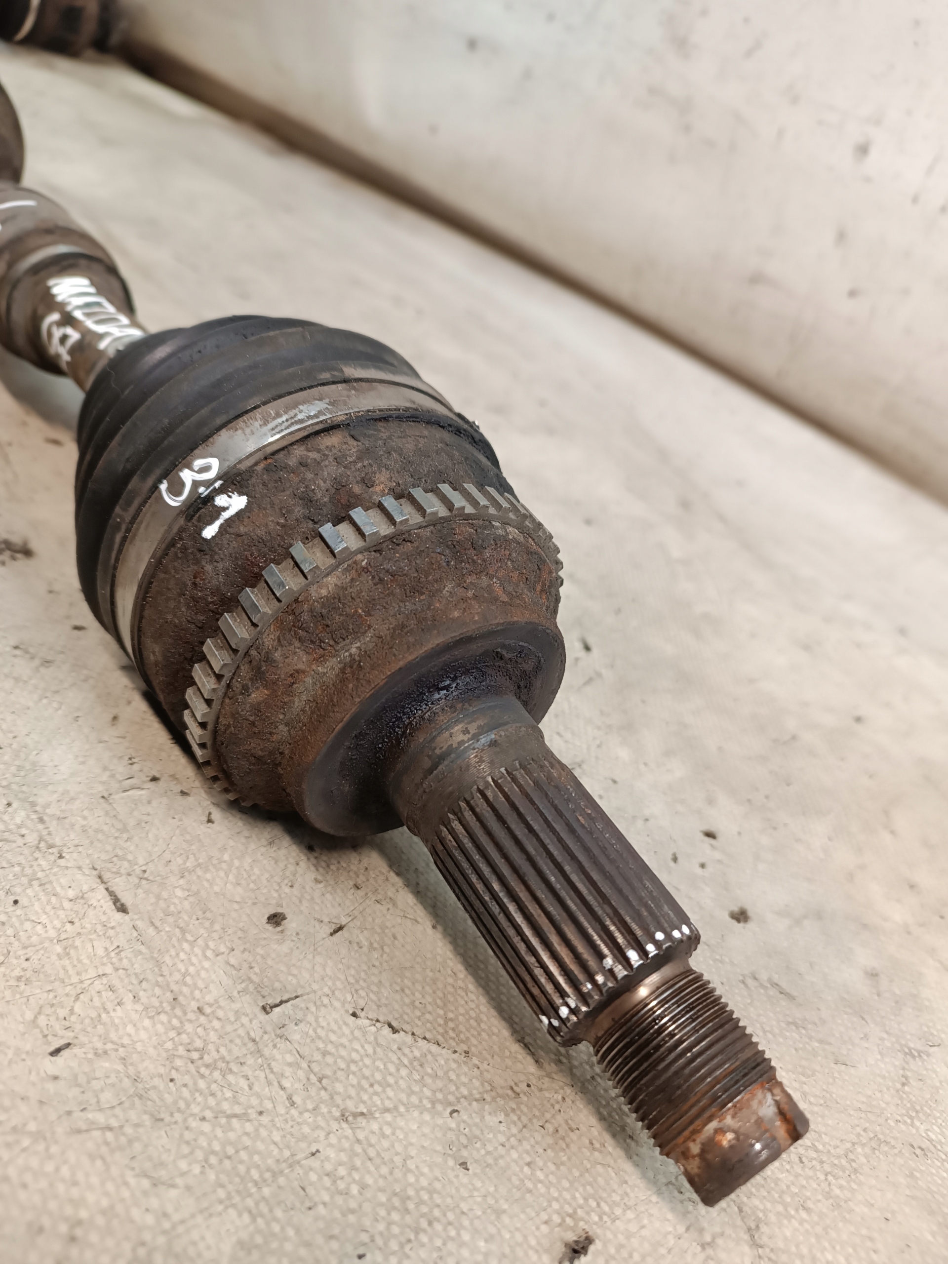 Mazda CX-7 semi-axis left front manual 4X4 2007r 2.3B