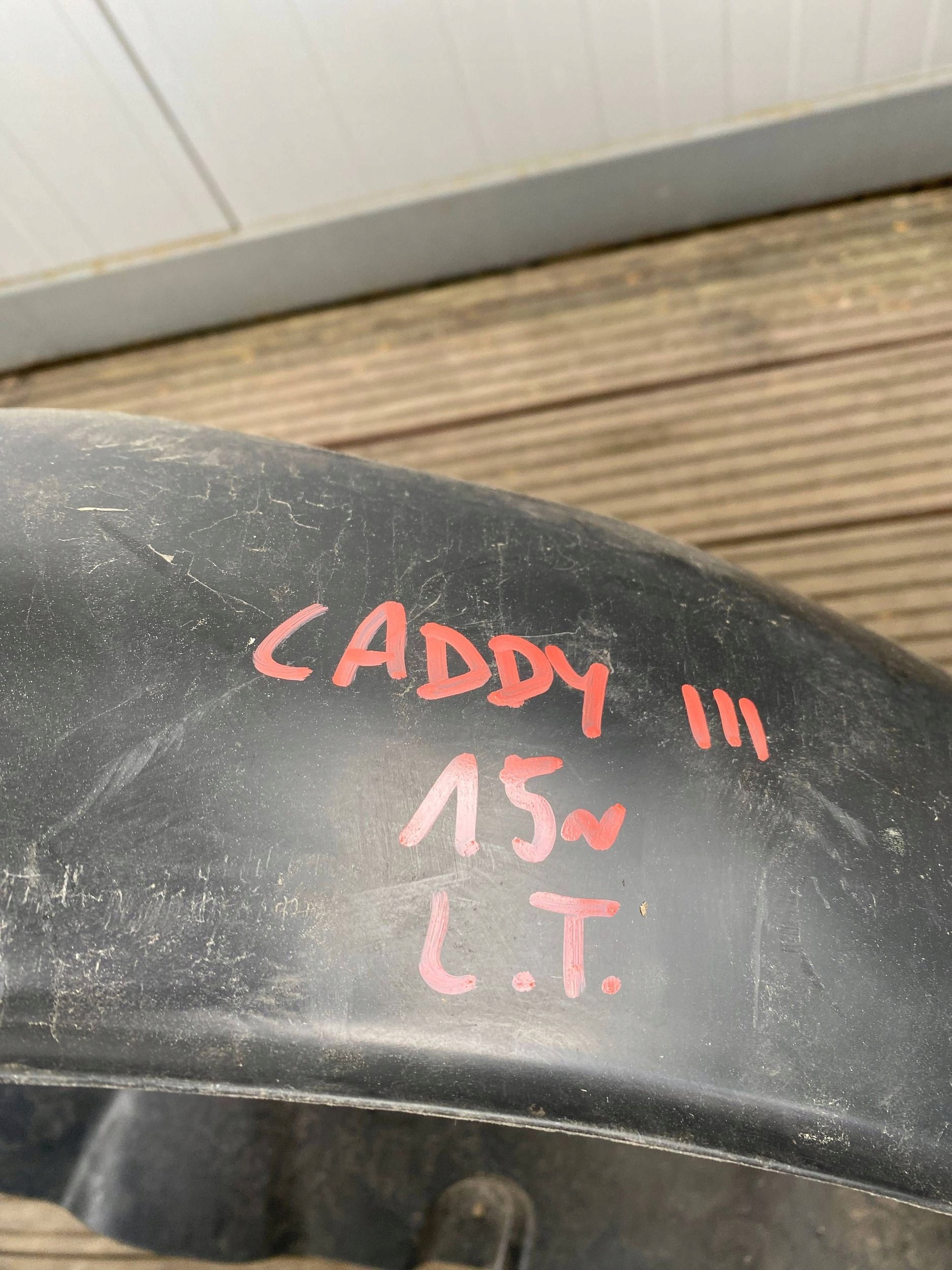 VW CADDY III 15- mudguard left rear part rear. 2K0810971E