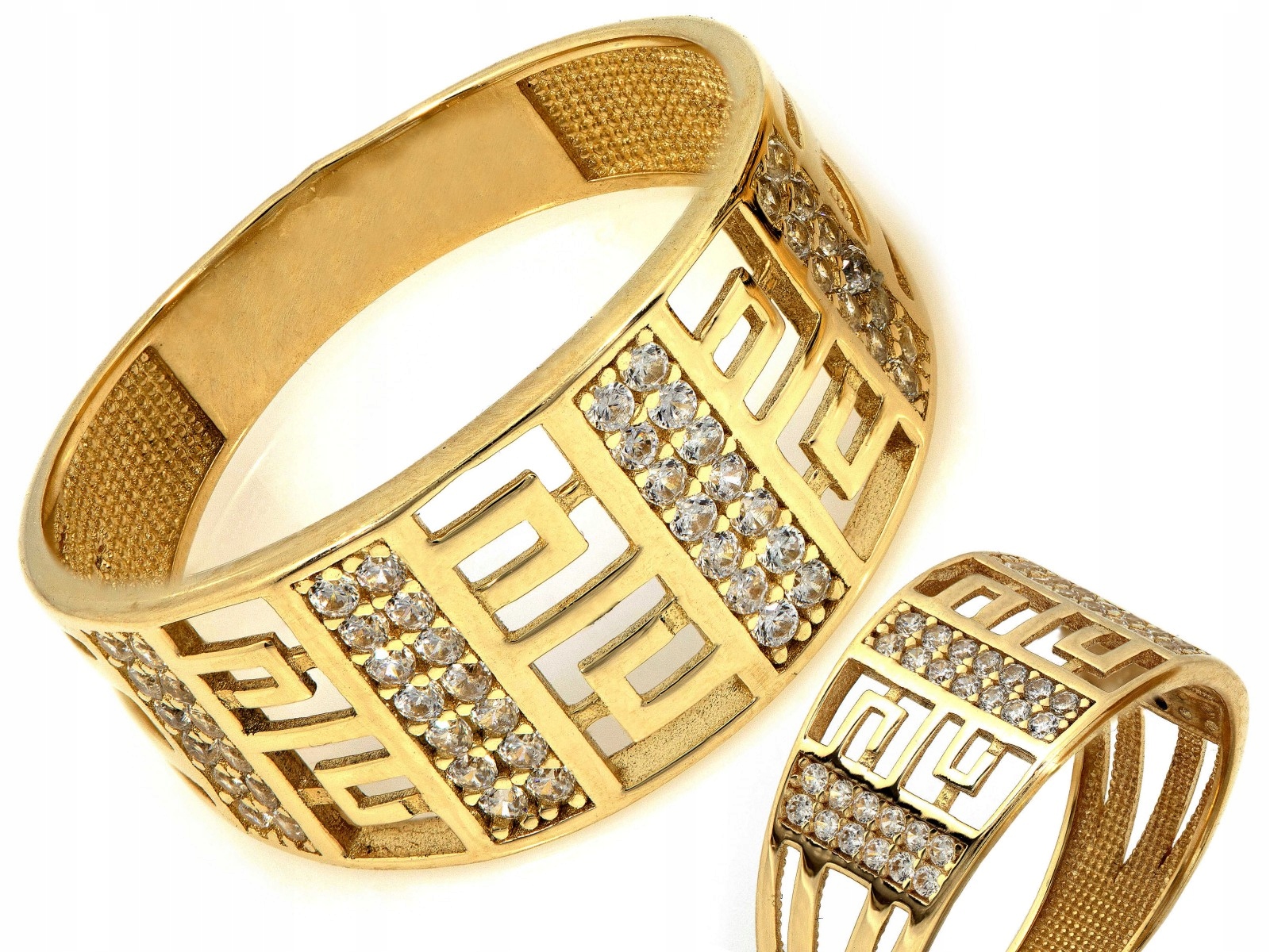 Zlatý 585 široký prstýnek s ažurovou lištou, řeckým vzorem a bílými zirkony