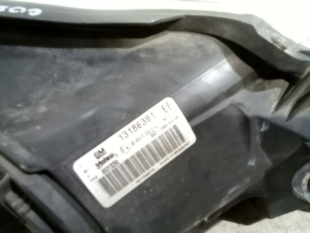 Opel Corsa D feu gauche avant avant 13186381