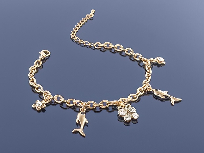 

Złota bransoletka Charms
