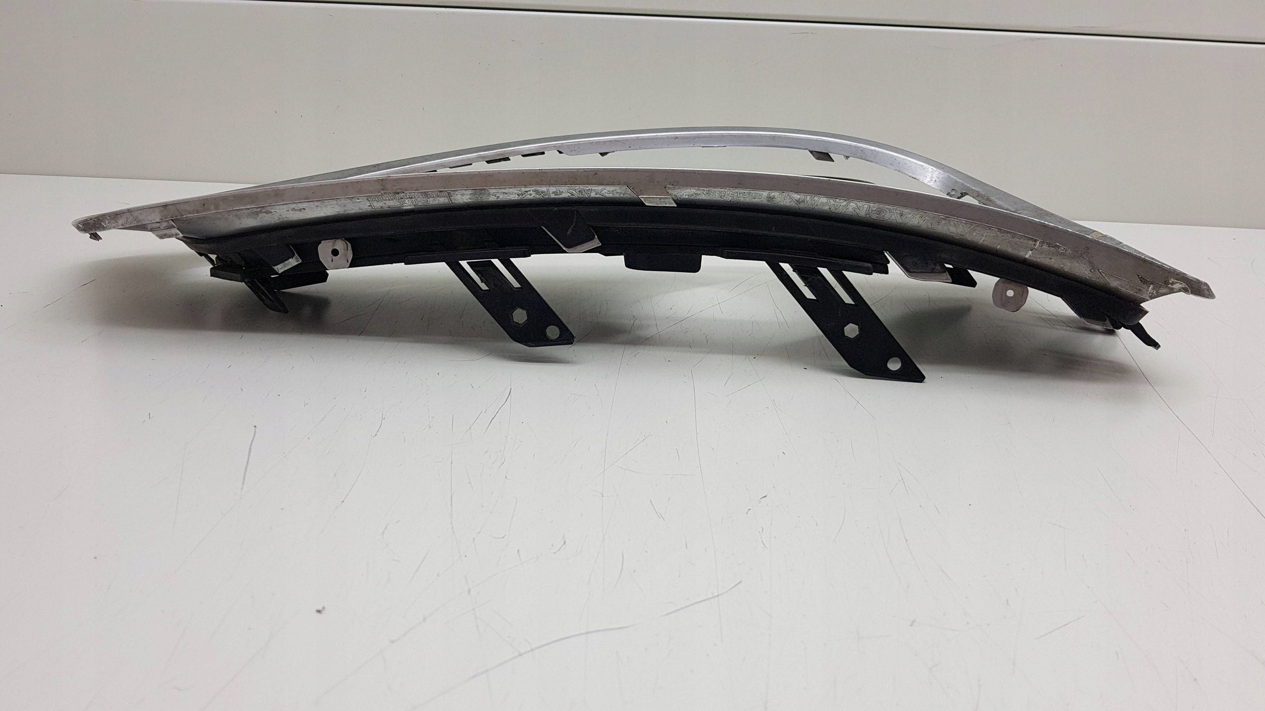 SAAB 95 9-5 AERO 2010 - left grid bumper PRZOD12843704