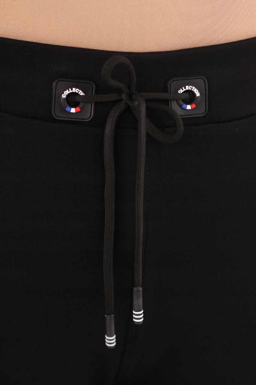 WYGODNE SPODNIE DRESOWE DAMSKIE NA GUMCE Z KIESZENIAMI ELASTYCZNE Wzór dominujący bez wzoru