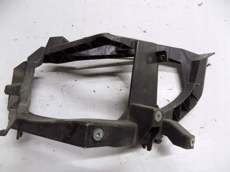 Mitsubish Colt VI Lift Okular lampy mocowanie lewy