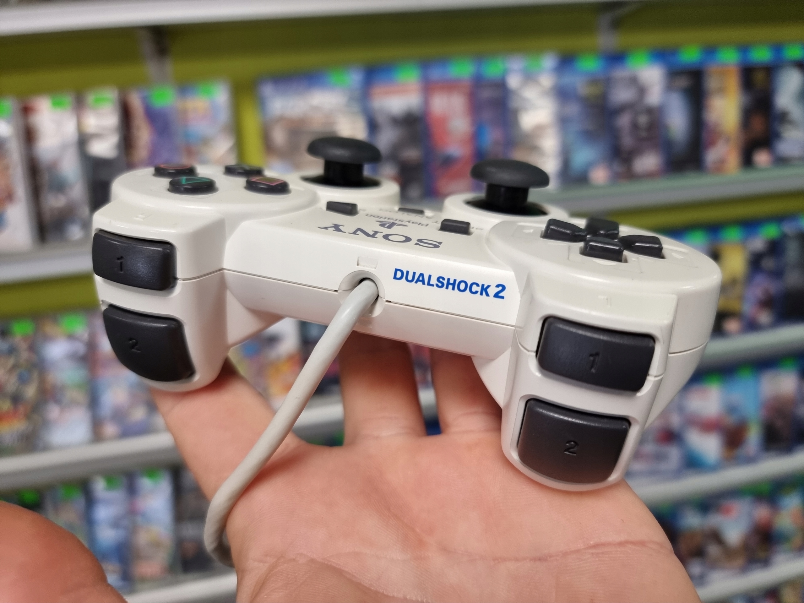 ORYGINALNY PAD SONY PS2 PLAYSTATION 2 DUALSHOCK 2 BIAŁY STAN IDEALNY Marka sony