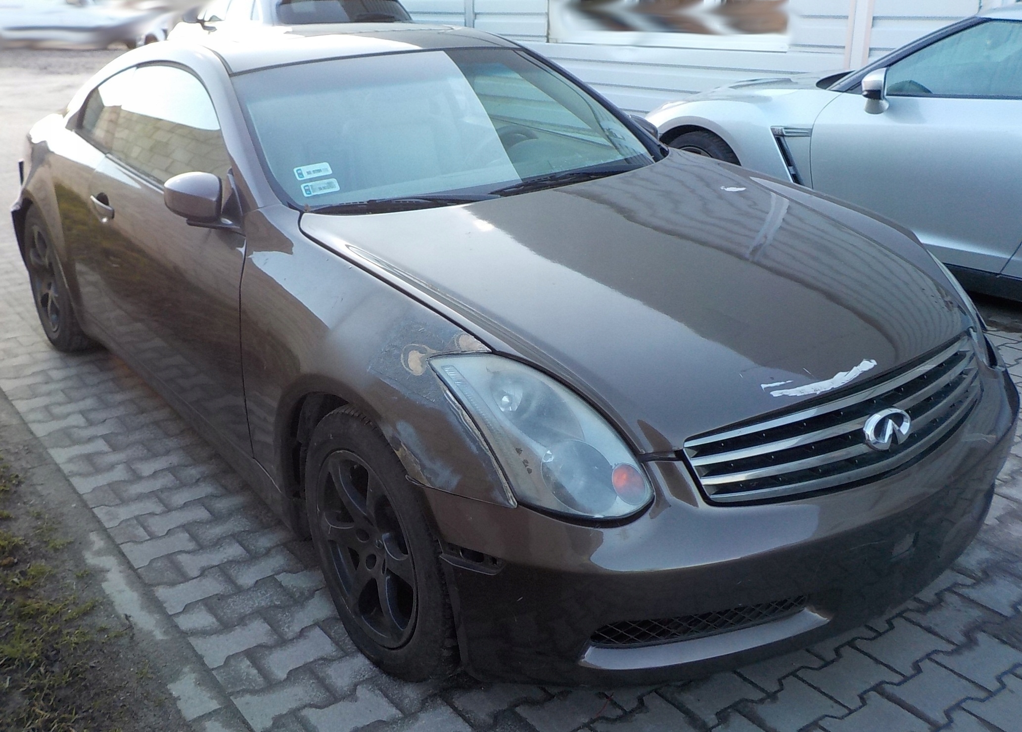 PODNOŚNIK SZYBY PRAWY LUB LEWY G35 COUPE 2005 Producent części Infiniti OE