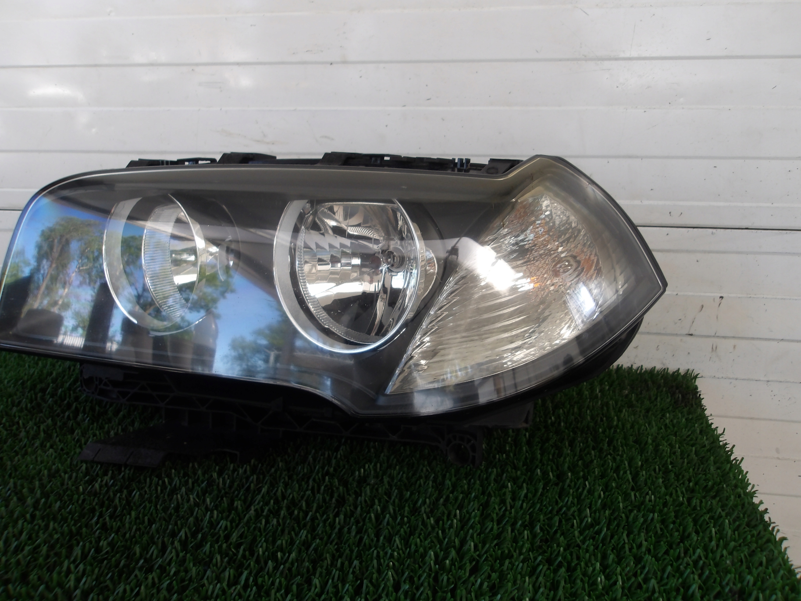 BMW X3 E83 LIFT feu avant gauche 7162189 EU OE
