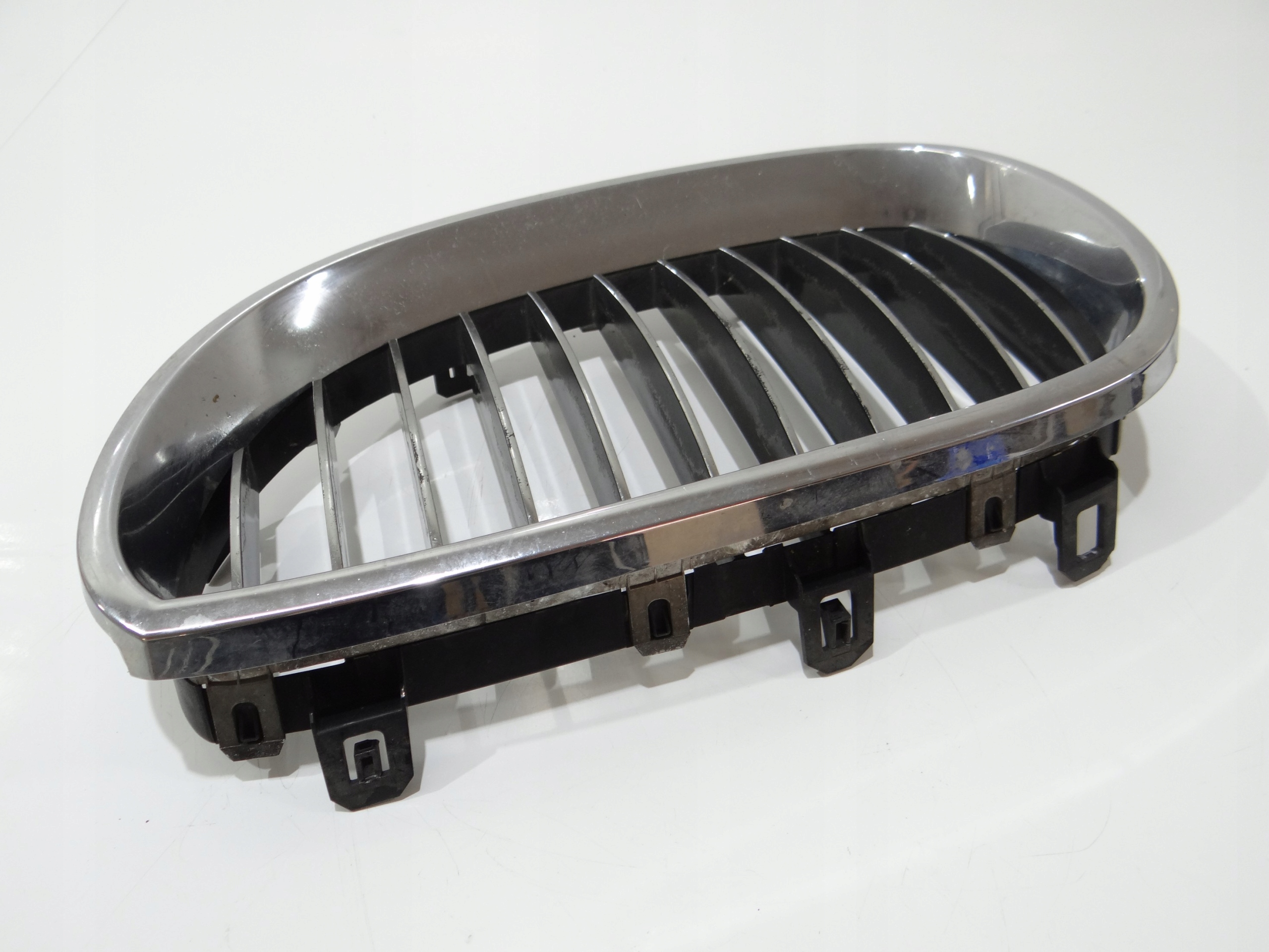 hűtőrács hip pack eleje bal BMW E60 E61 7065701 (4273211)
