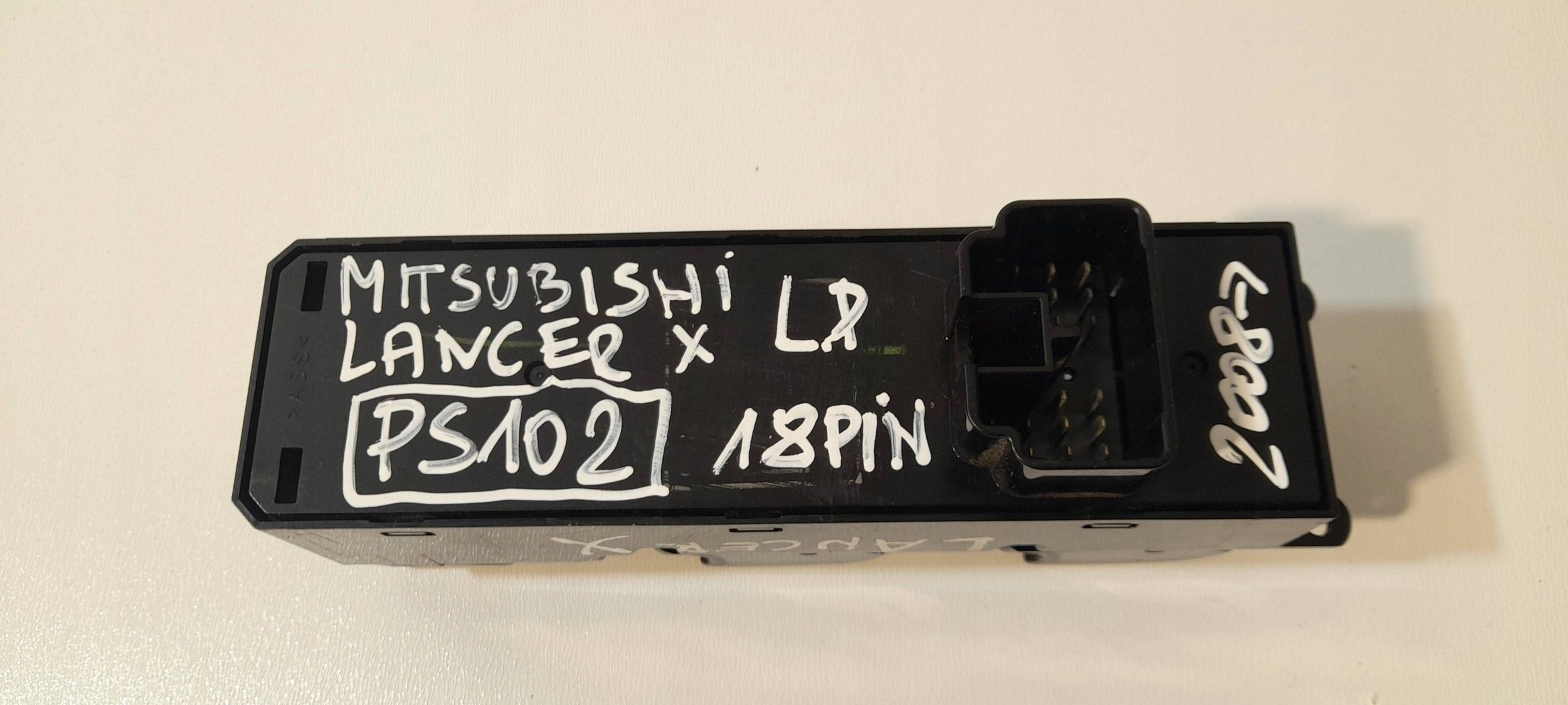 Mitsubishi Lancer X opening control switch of the window (PS102)