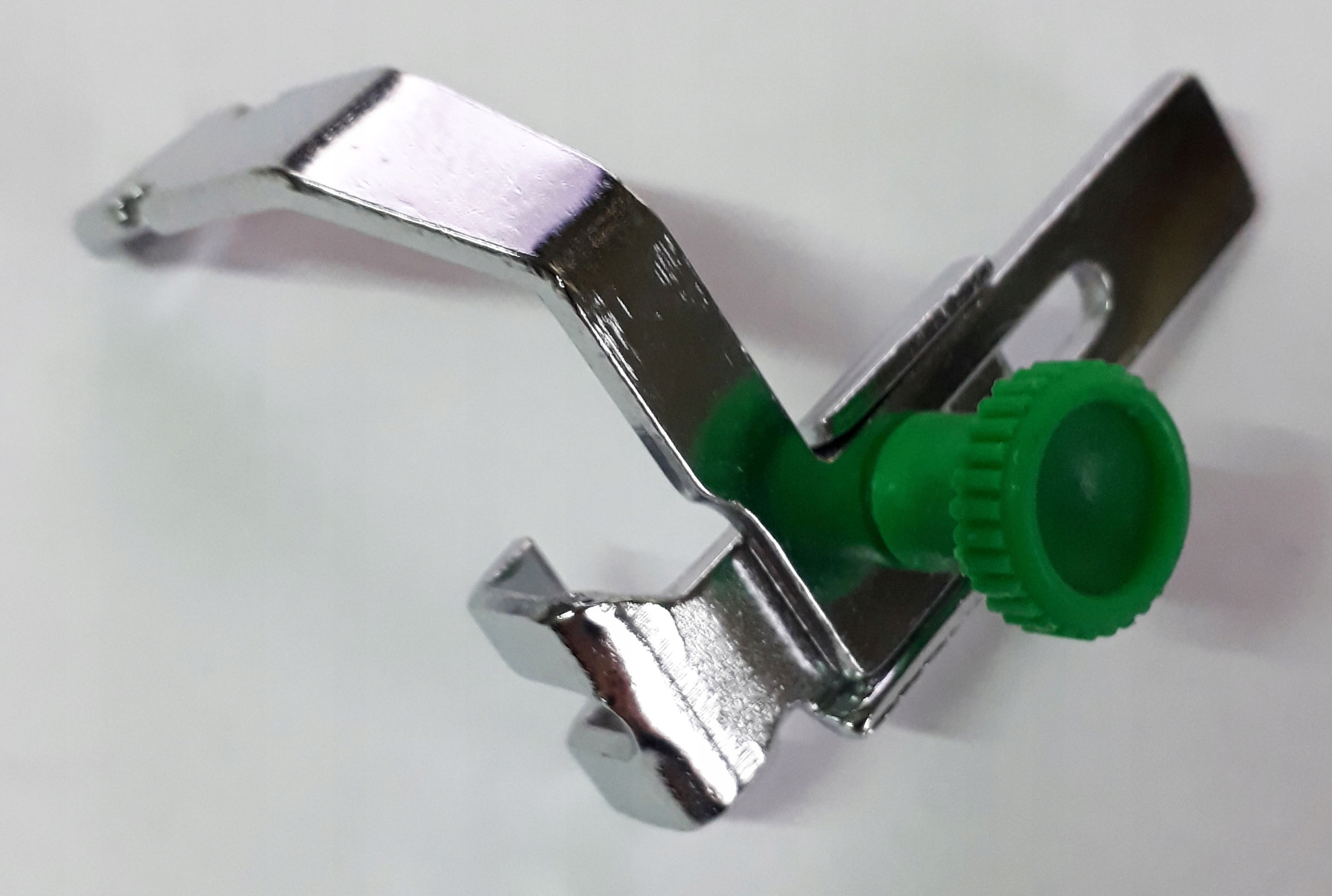 Stopka regulowana do wszywania zamków Singer S582