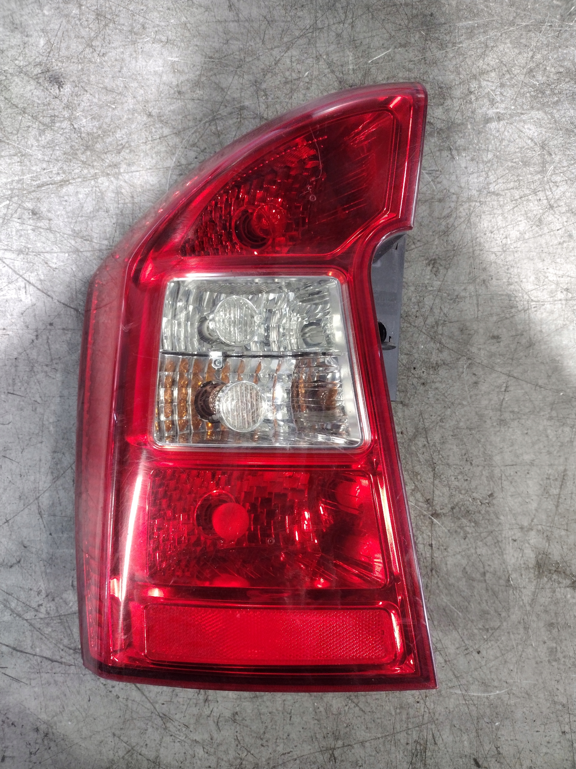 фонарь левый kia CARENS III