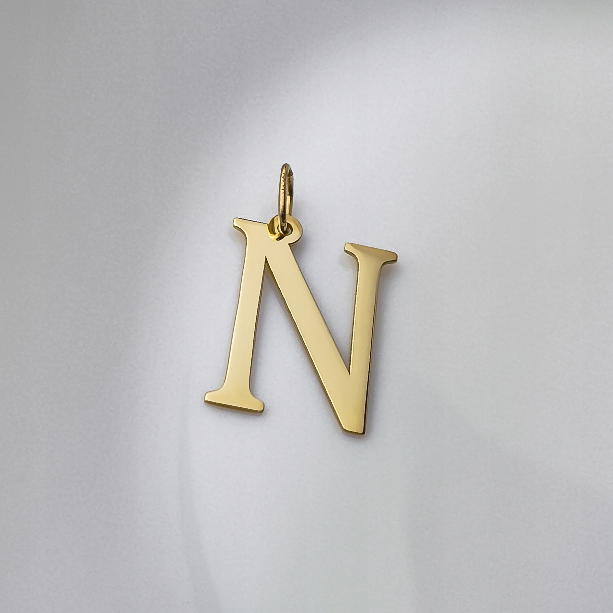 Zlatý přívěsek Písmeno „n“ pr. 585