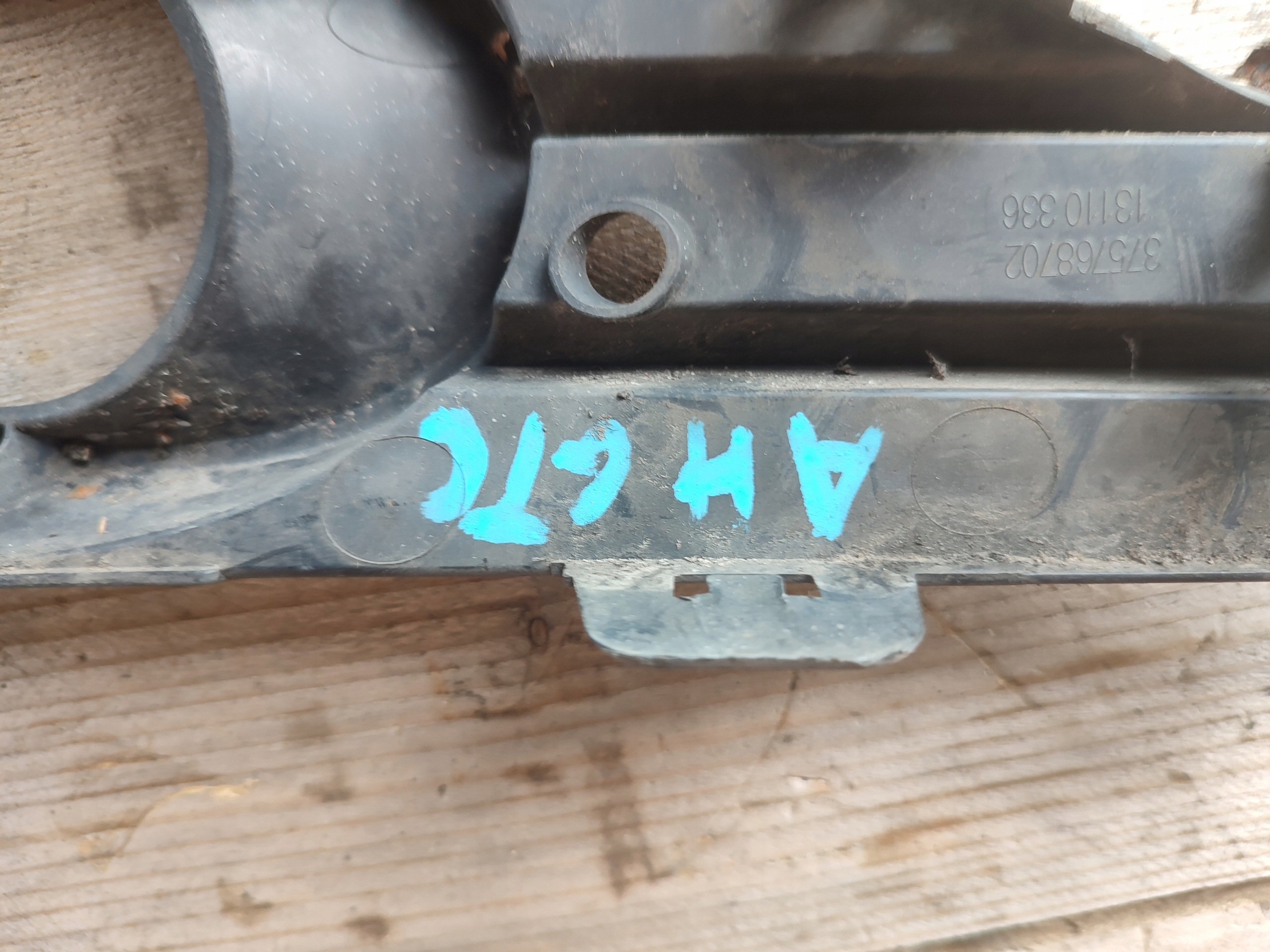 grid lower of a bumper left front OPEL ASTRA H GTC 13110336