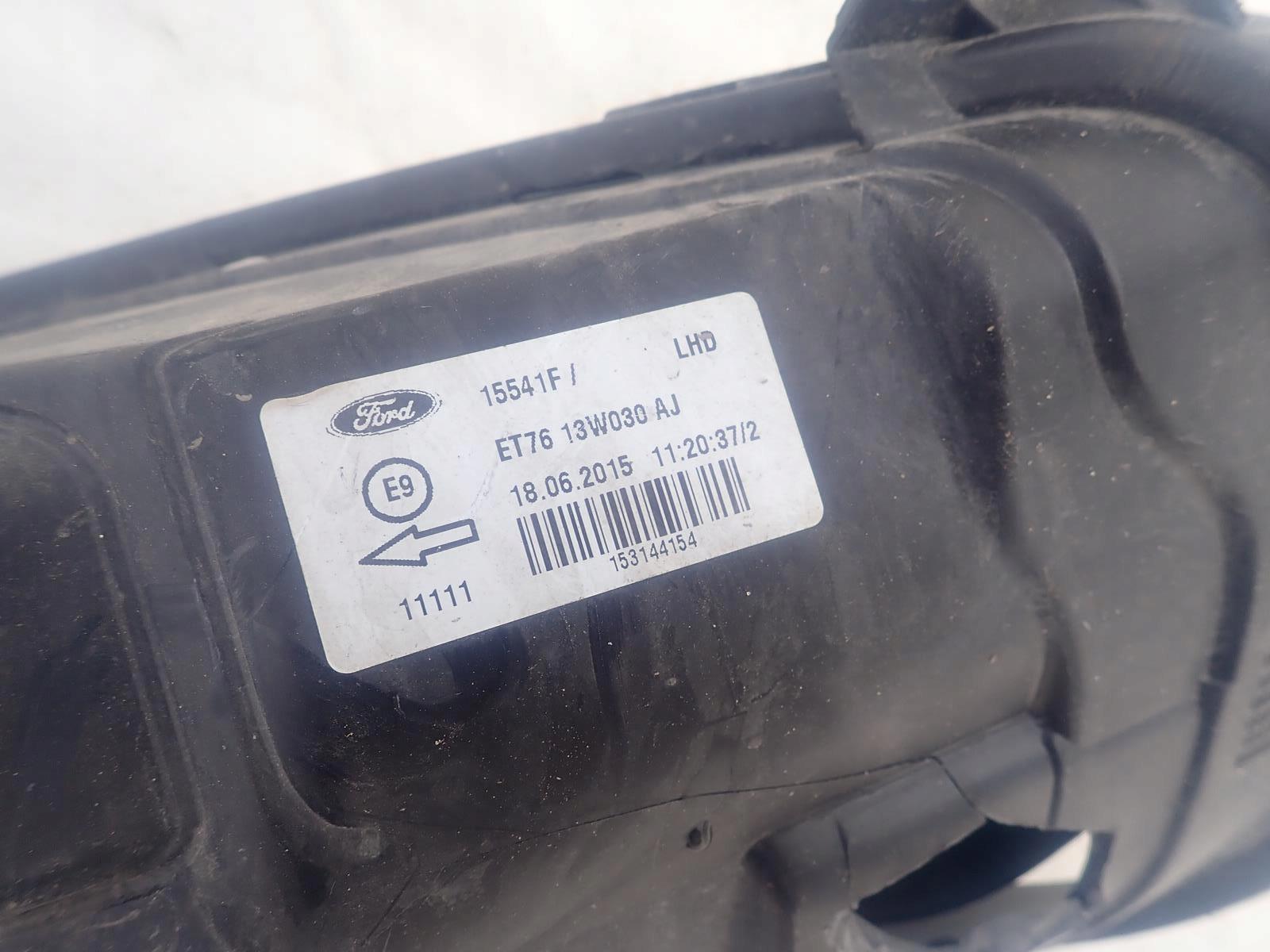 FORD TRANSIT COURIER 14- light front front left