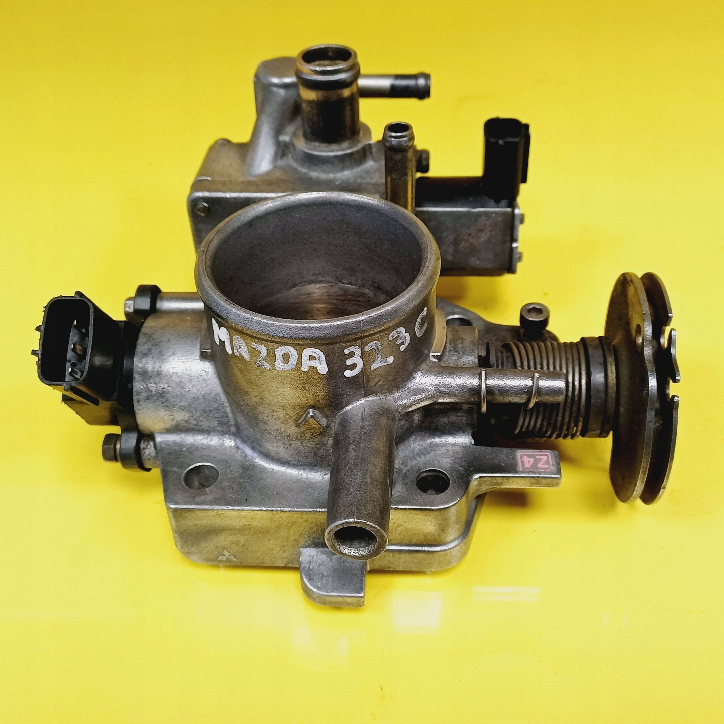 ДРОССЕЛЬНАЯ ЗАСЛОНКА mazda 323 C NR580