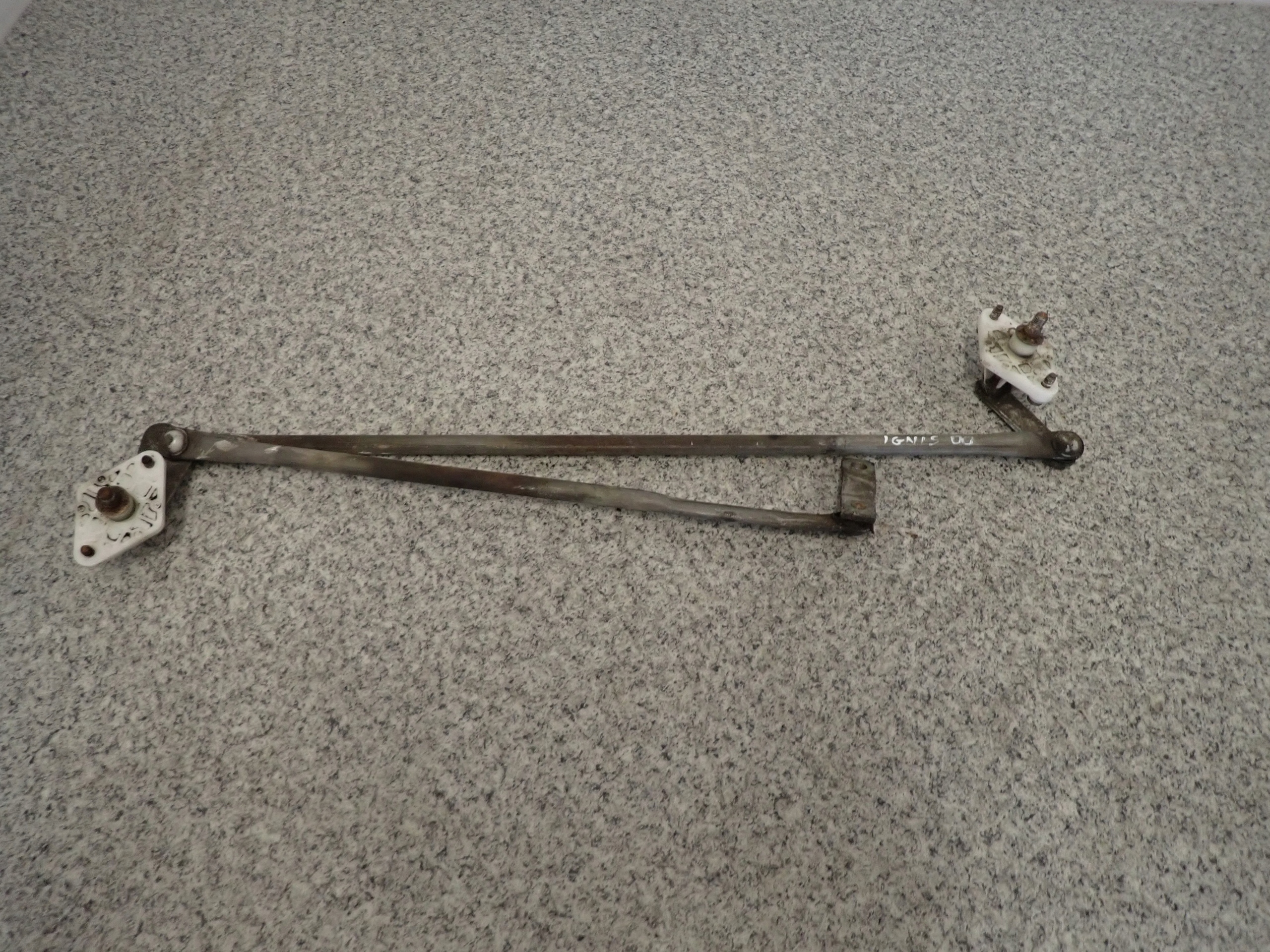 SUZUKI IGNIS 00-03 МЕХАНІЗМ СКЛООЧИСНИКА ПЕРЕДНІЙ