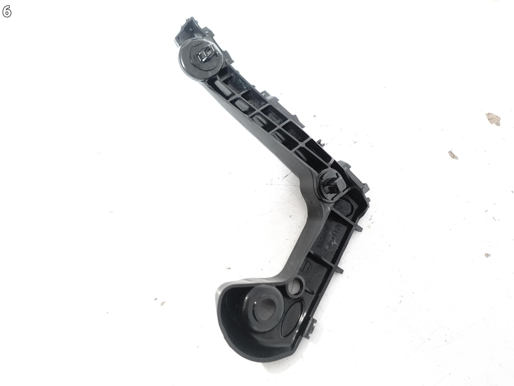 TOYOTA COROLLA E21 XII 18- support holder W bumper front left ORG