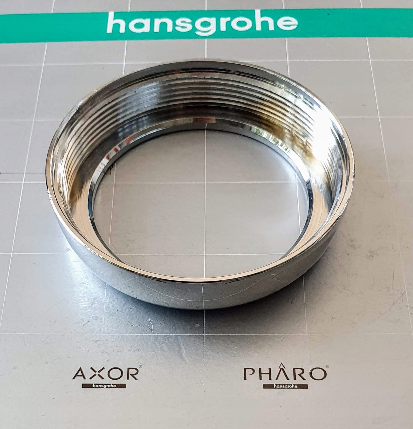 HANSGROHE Rozeta mocująca wylewkę 94119000 w bat. Marka Hansgrohe