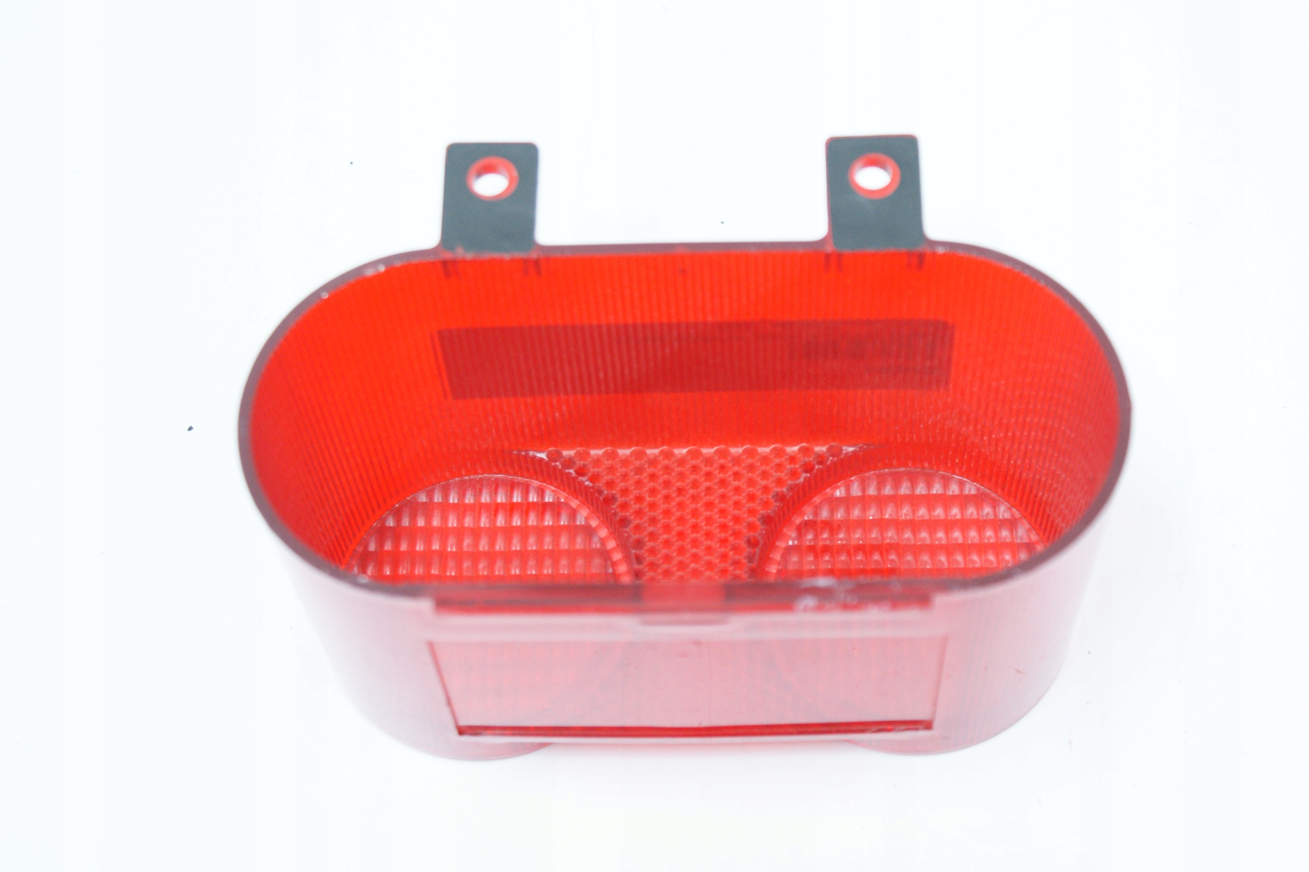 Klosz lampy tyl tylnej TRIOM Piaggio Quartz 50 Producent czesci Piaggio oryginalne OE