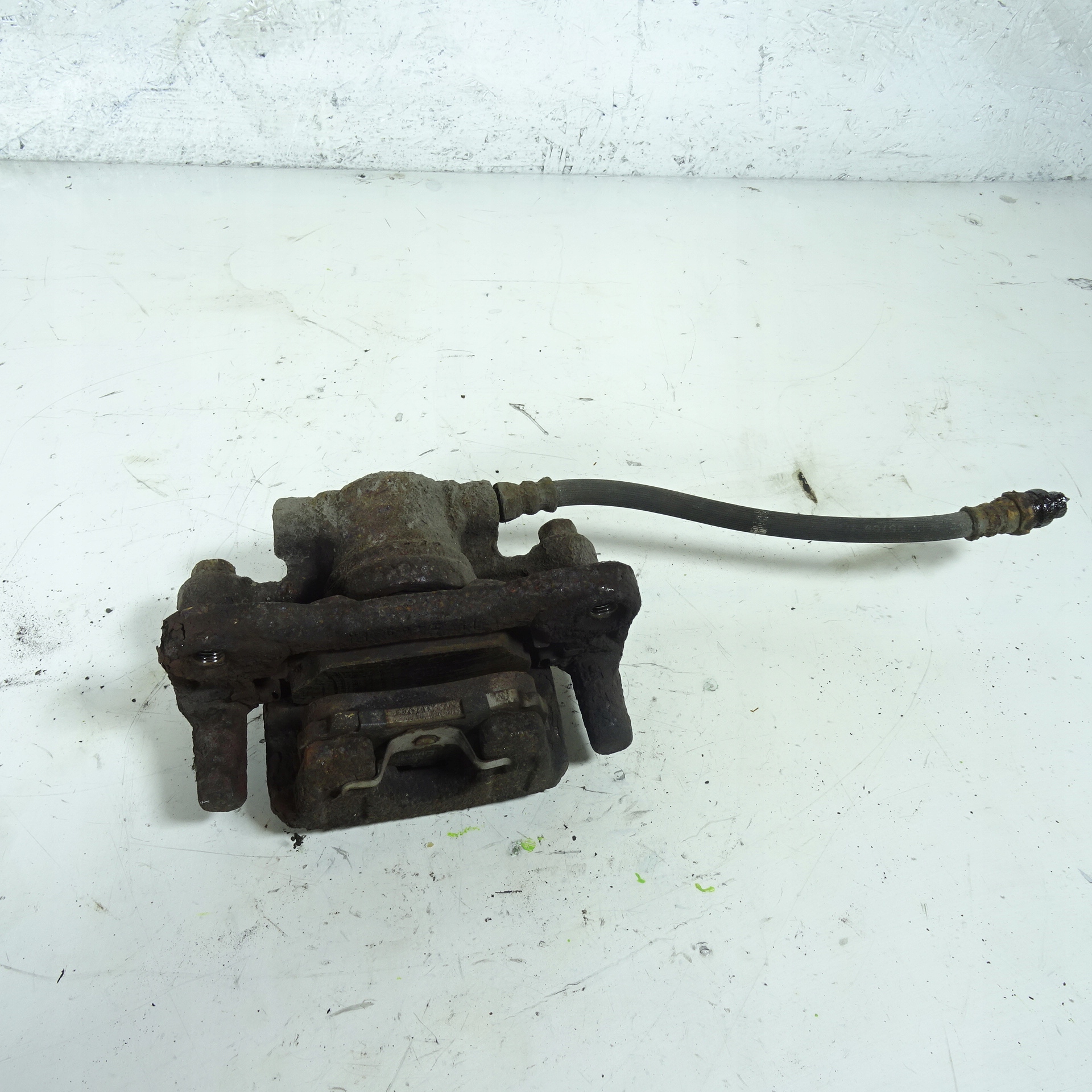 MITSUBISHI LANCER VIII caliper brake rear part left