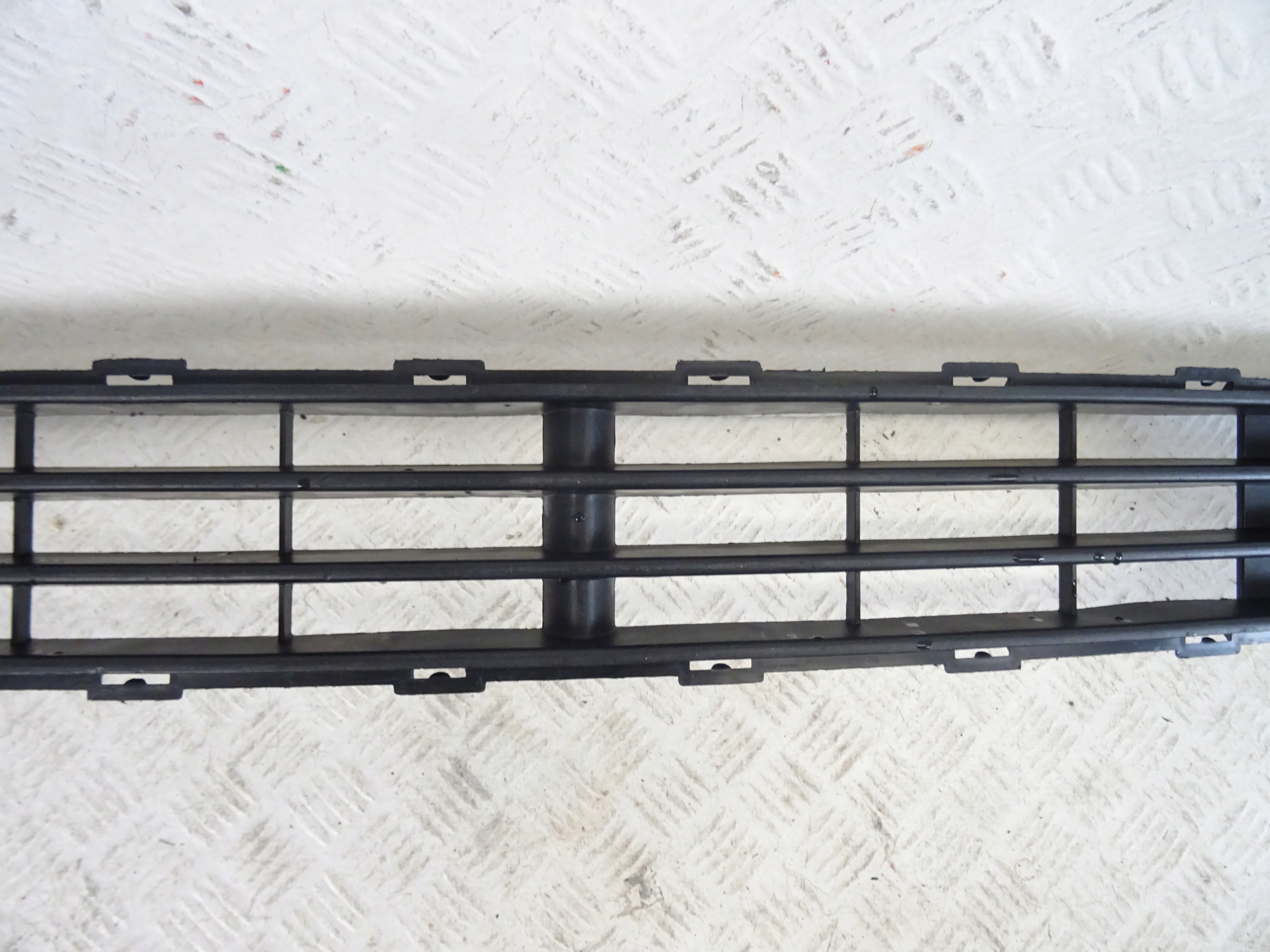 grid of a bumper front front KIA RIO III 3 86522-1G010