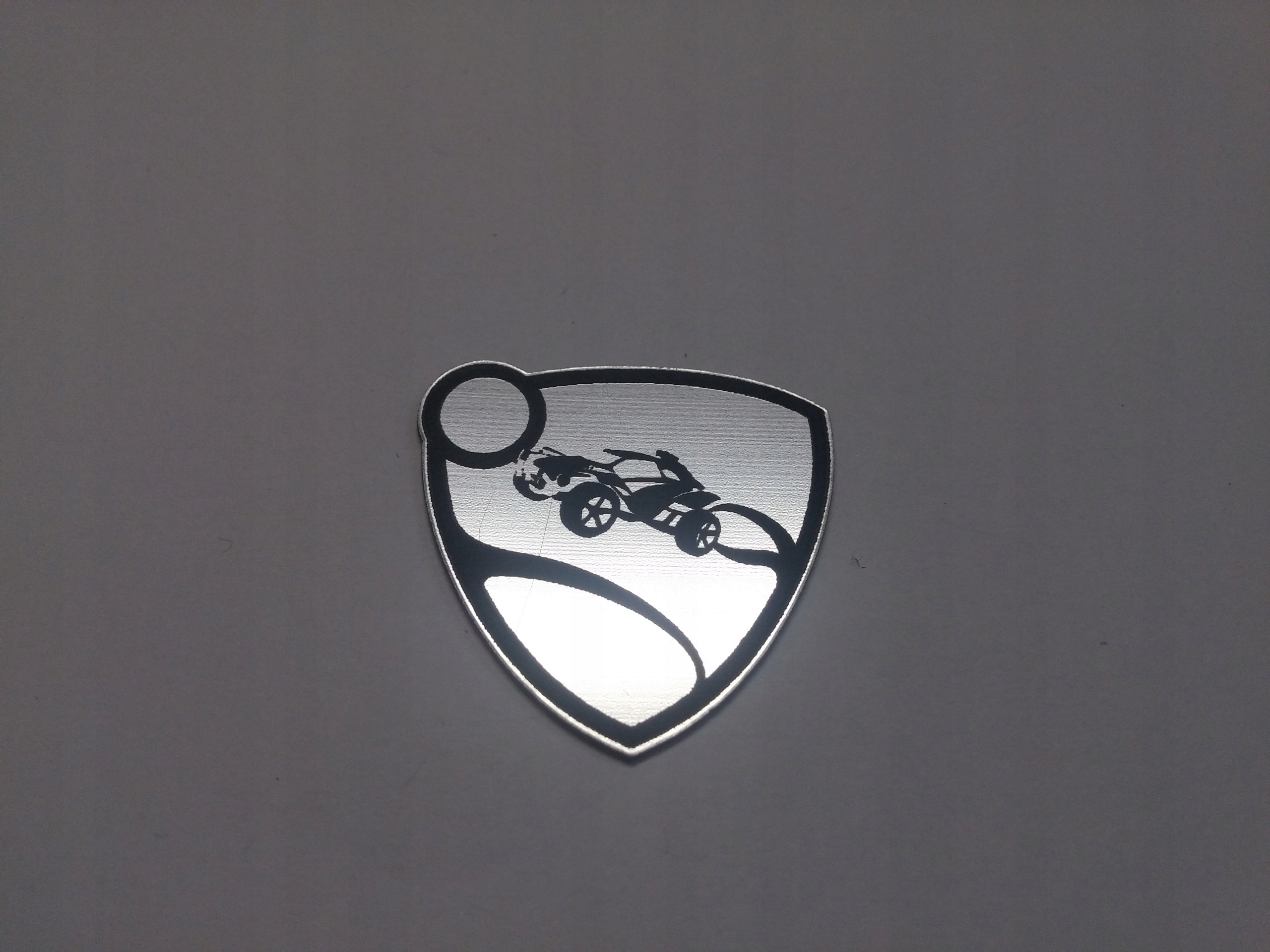 

Rocket League naklejka emblemat 29 x 29mm *srebrna