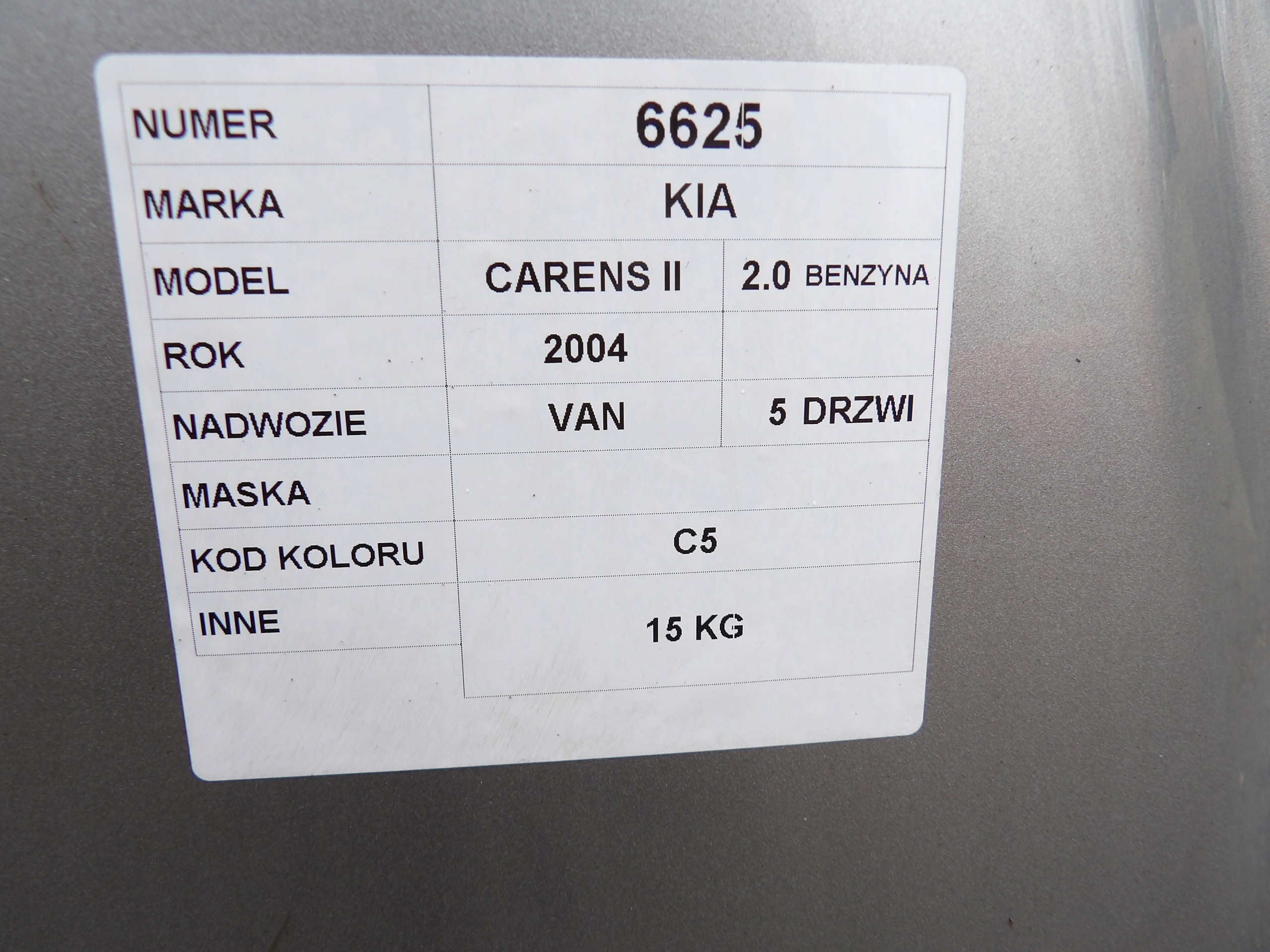 Kia Carens II bonnet lak. C5
