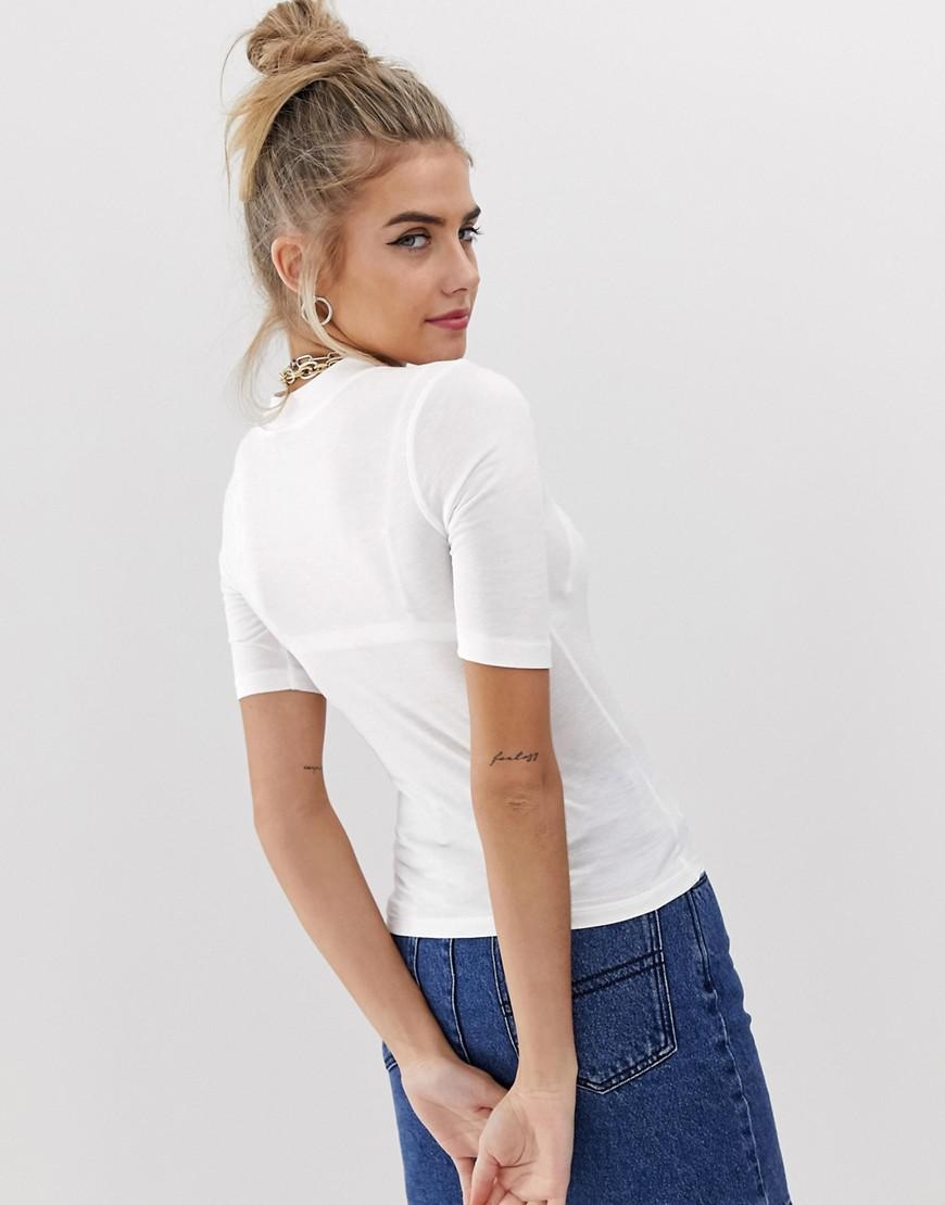 COLLUSION BIAŁY DOPASOWANY TOP ZE STÓJKĄ 36 AS8 Materiał dominujący wiskoza