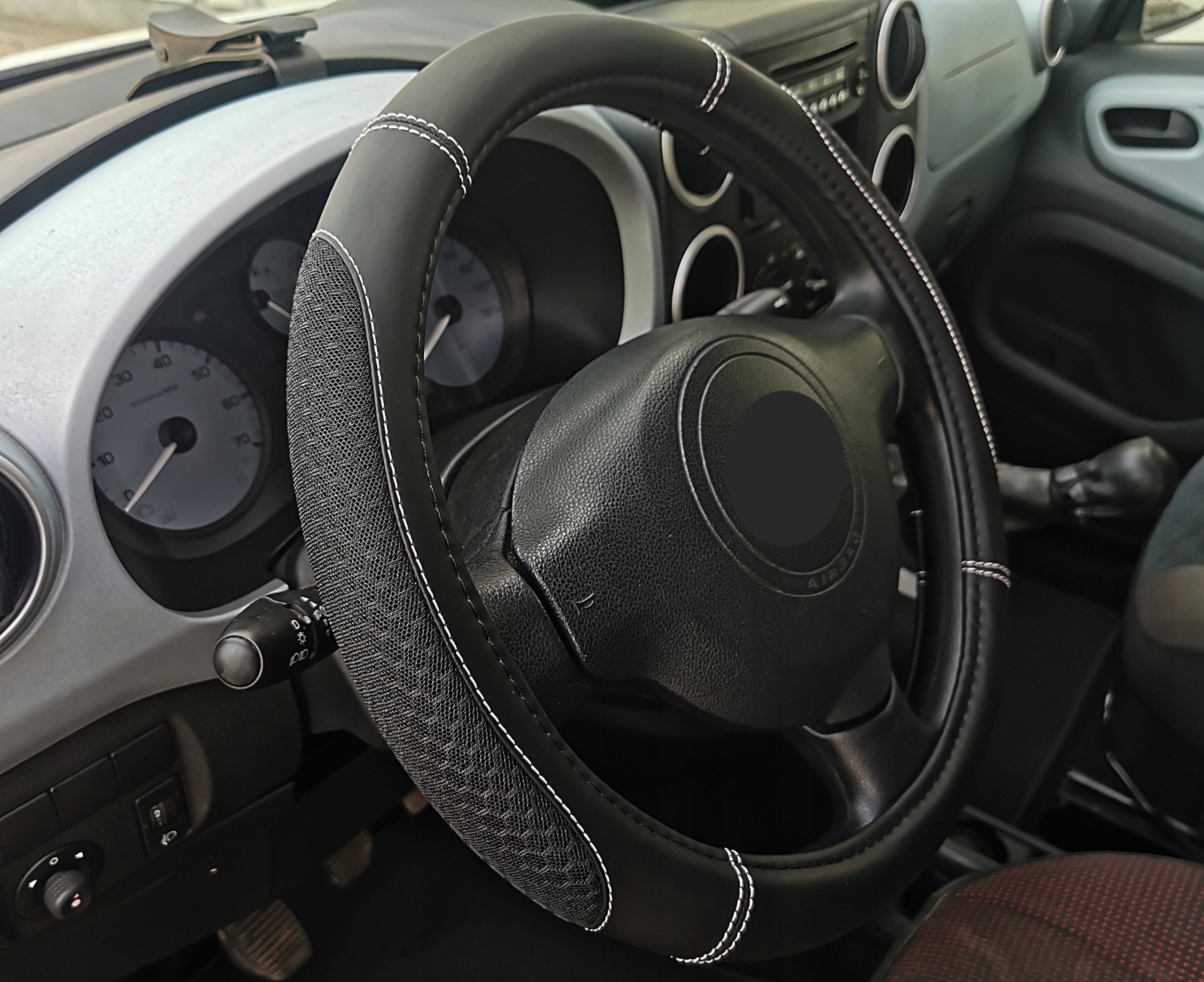 Opel Astra Corsa Meriva Mokka pokrowiec na kierownice materiał ANTYPOŚLIZG Waga produktu z opakowaniem jednostkowym 0.5 kg