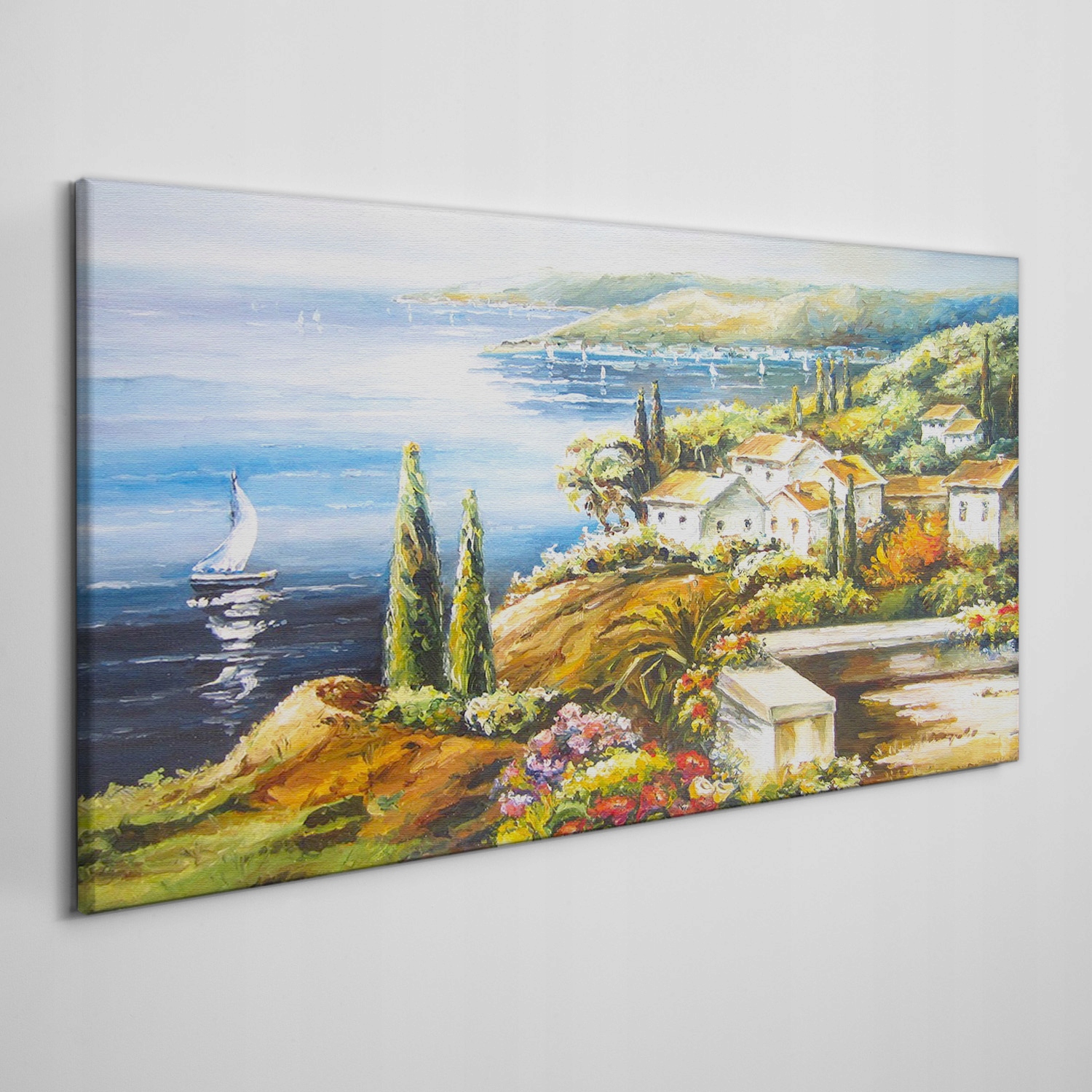 

Obraz płótno Wybrzeże wioska łodzie kwiaty 140x70